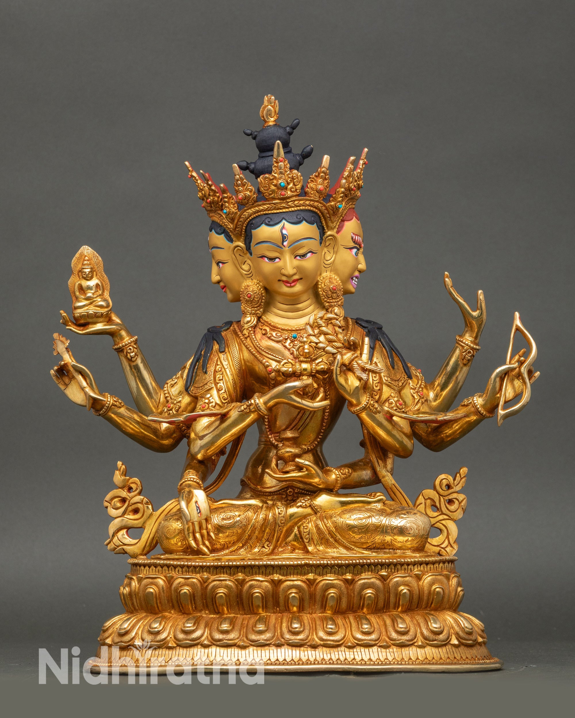 Front view Namgyalma statue gold gilded with three faces and semi precious stones