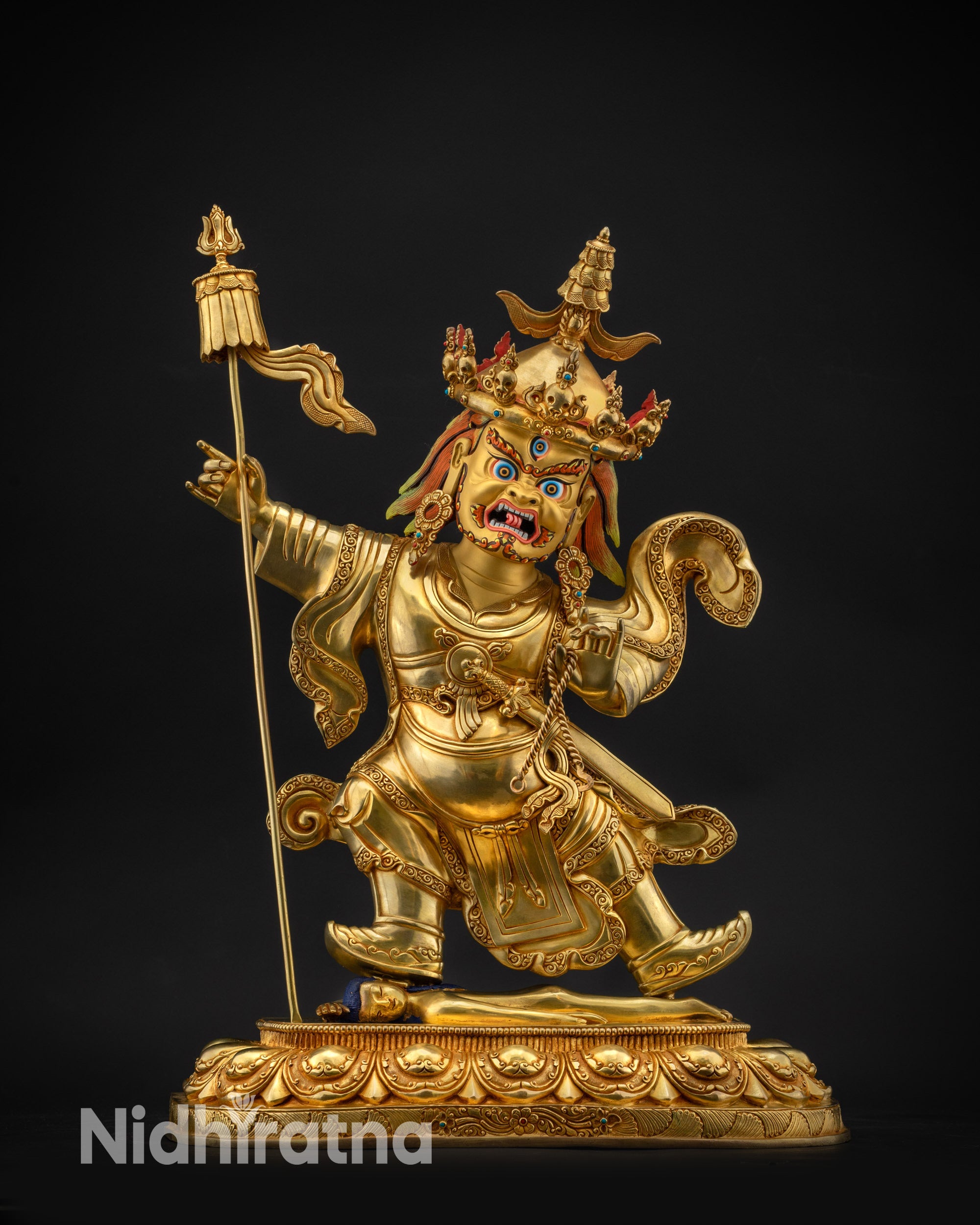 Front view Nechung Chuyong Statue showing wrathful face and skull crown details