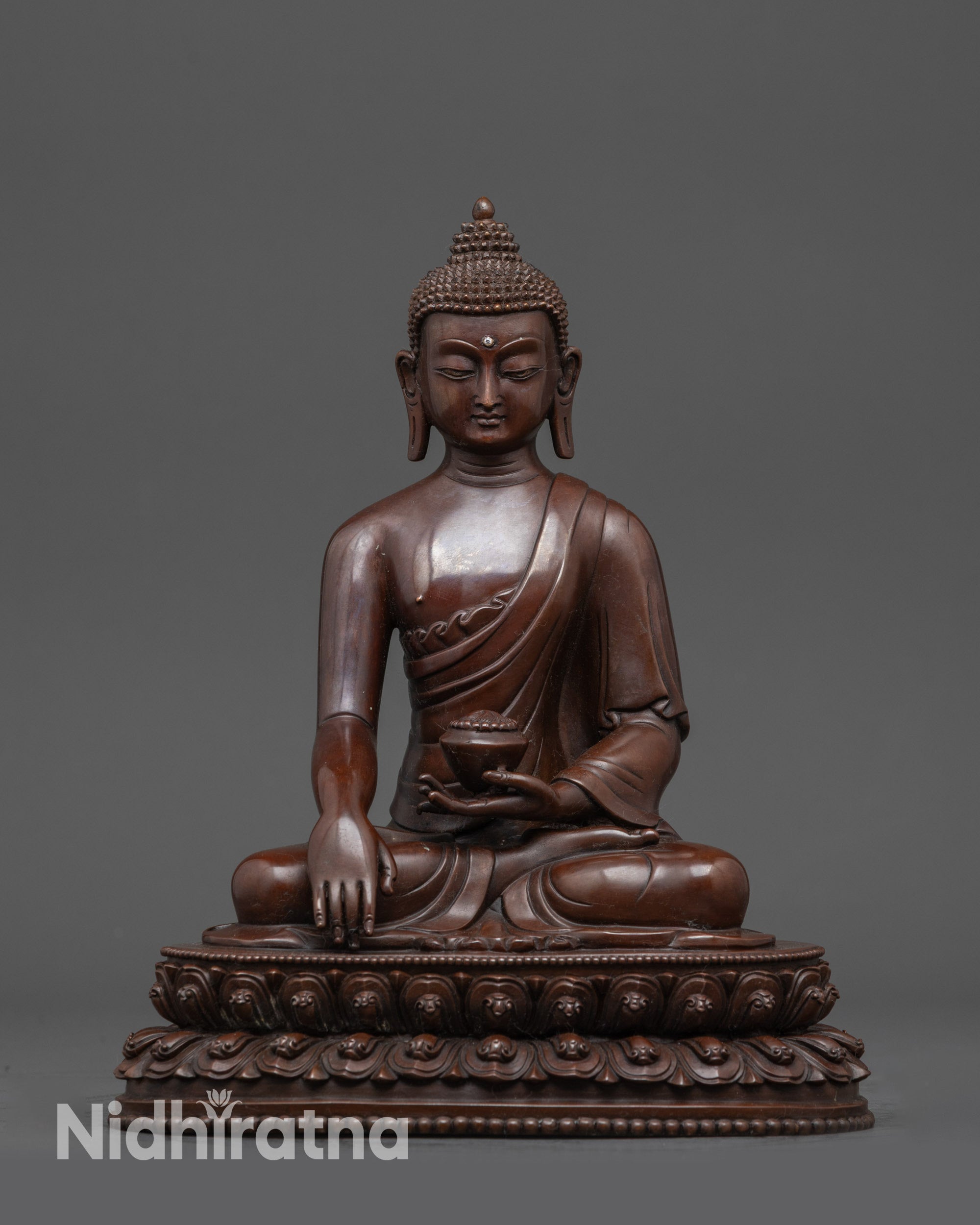 Front view Oxidized Shakyamuni Buddha statue seated on double-layered lotus seat