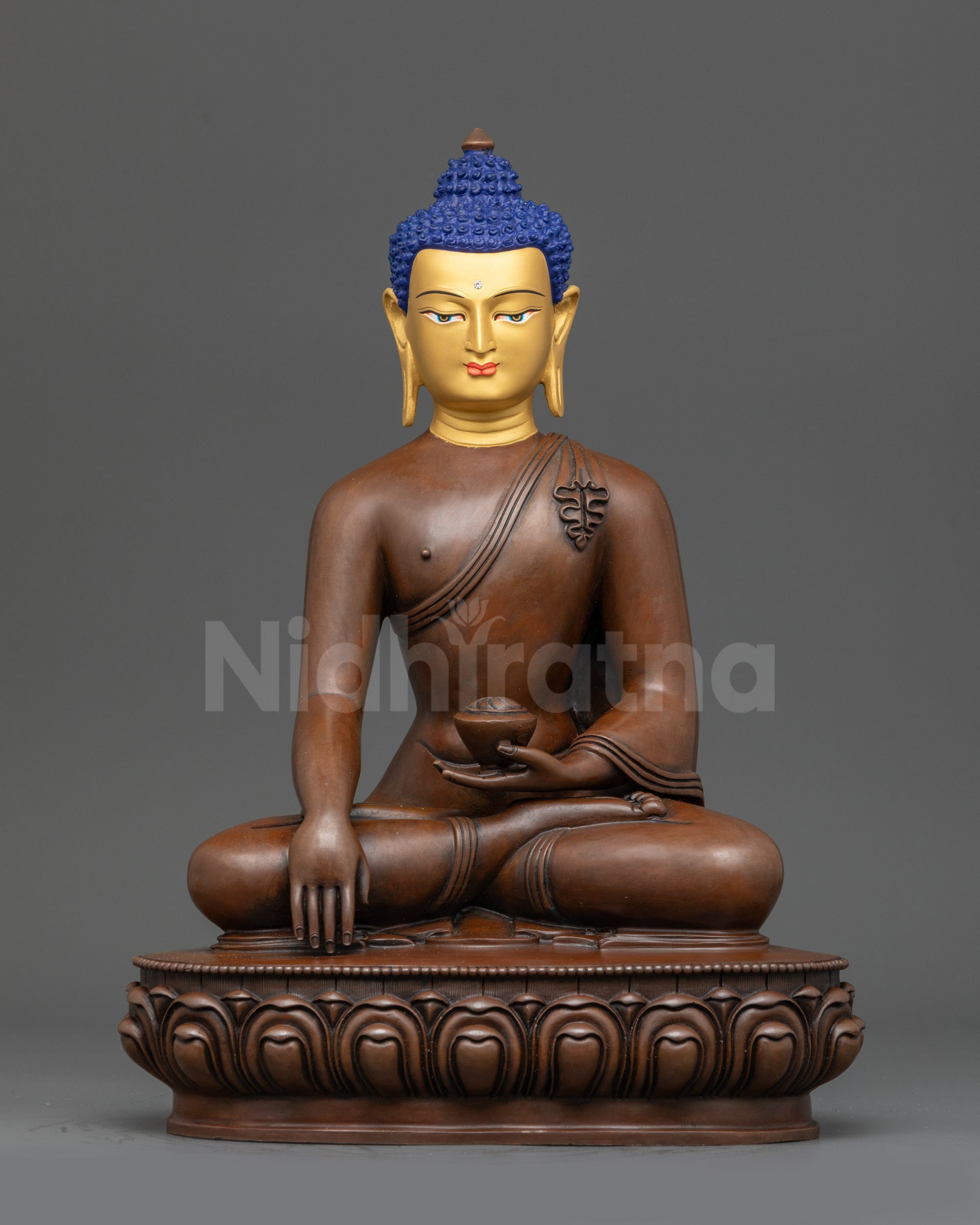 Front view Oxidized Shakyamuni Buddha statue seated on lotus with gold-gilded face