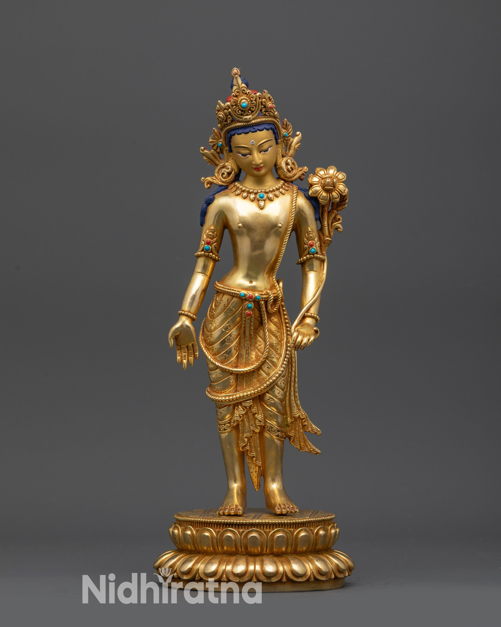 Front view Padmapani statue on double-lotus seat with gold-gilded face