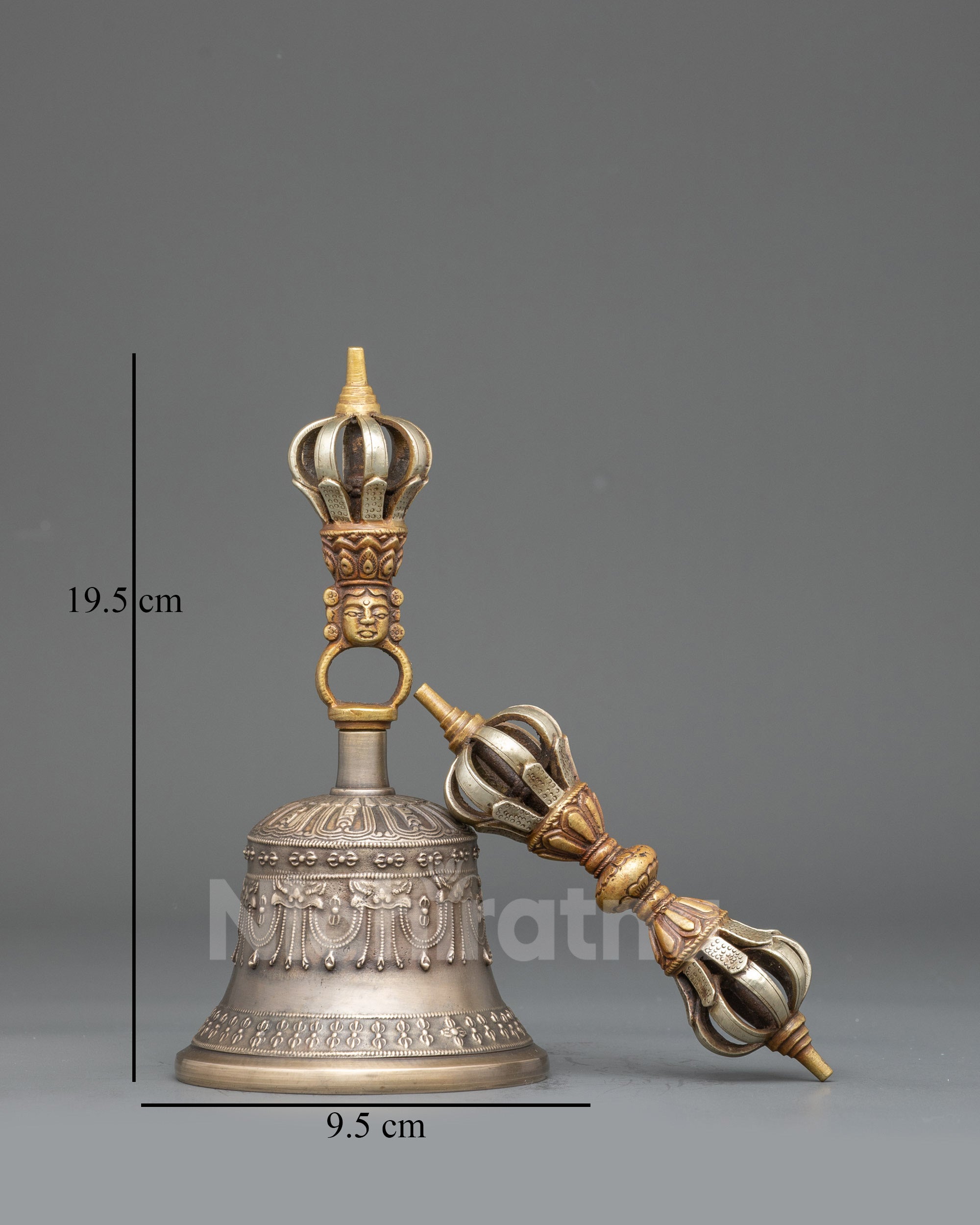 Front view Sacred Himalayan Vajra & Bell | Bronze bell with copper handle and carved deity