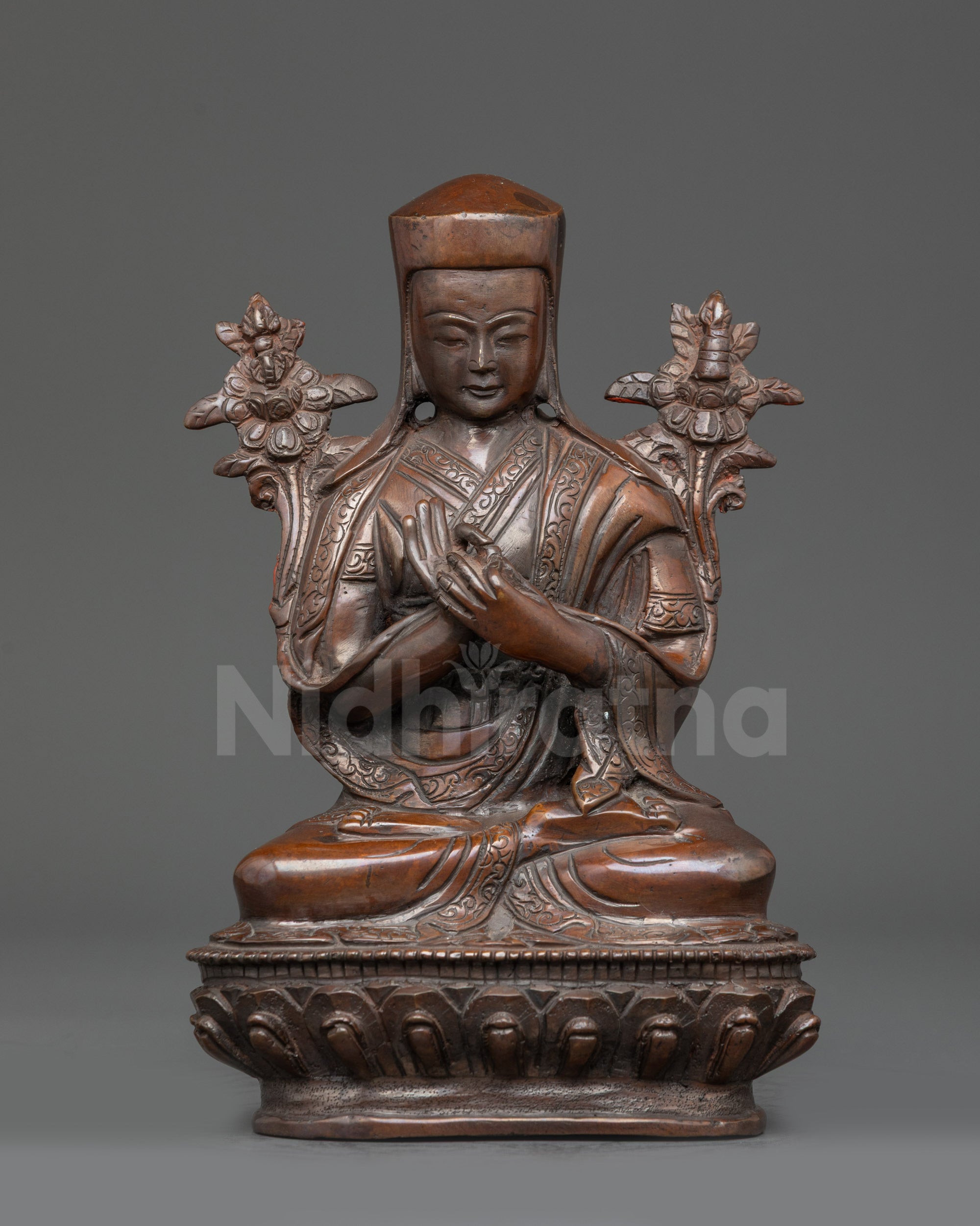 Front view Sacred Je Tsongkhapa Statue oxidized copper monk seated on lotus Himalayan art