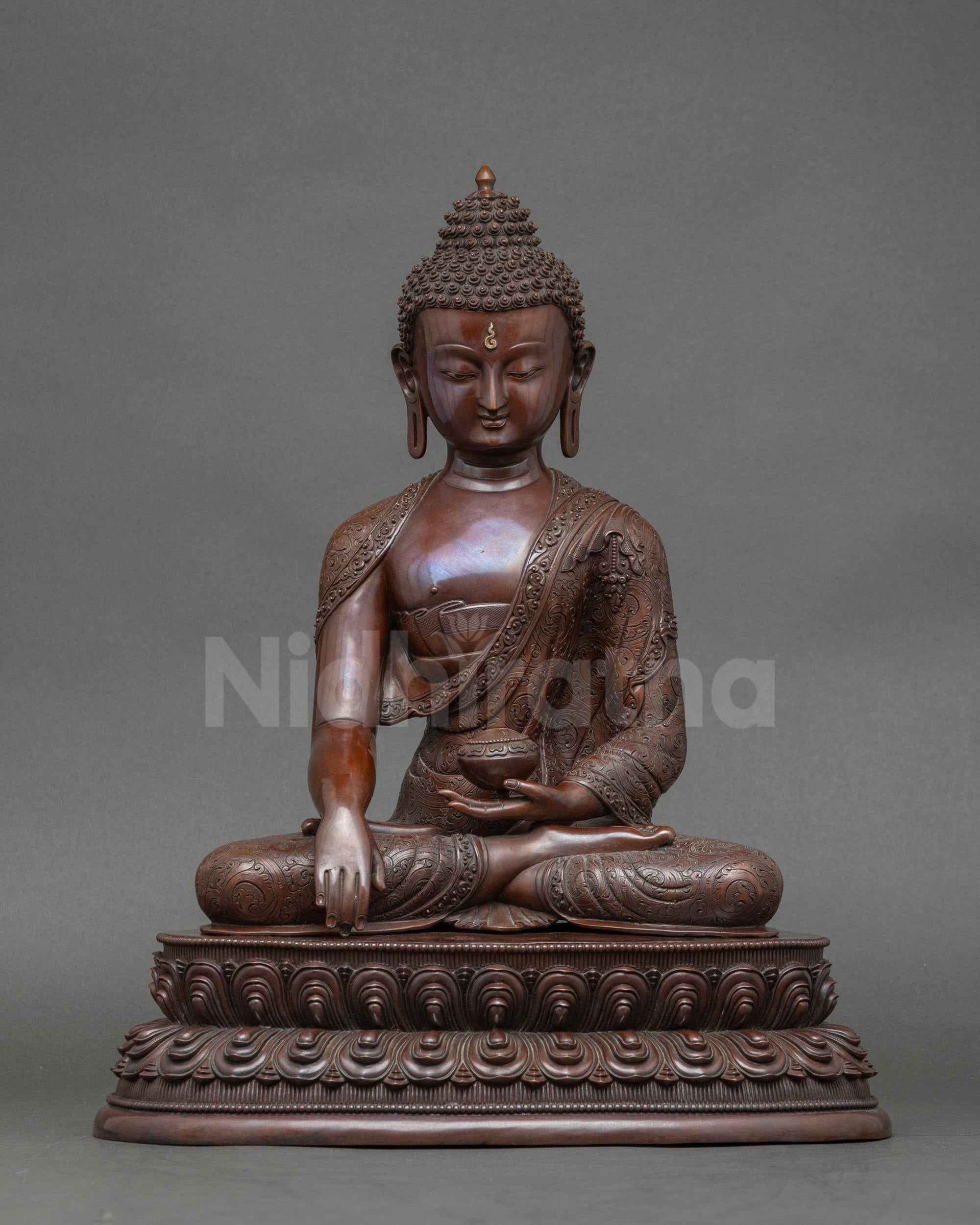 Front view Shakyamuni Buddha statue earth touching mudra oxidized copper Nepal