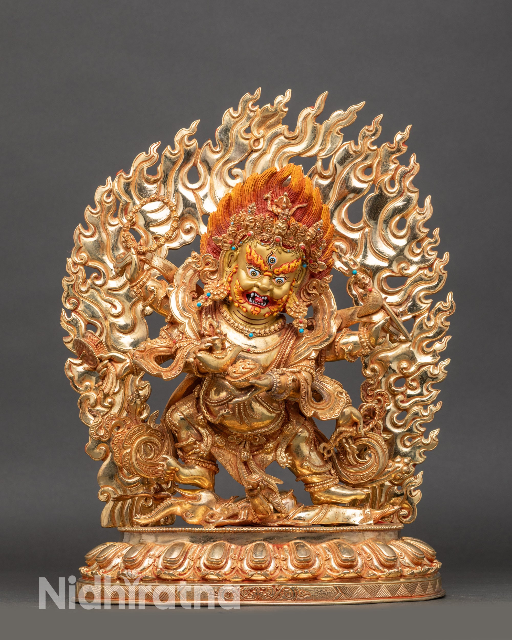 Front view Six-Armed Mahakala statue, copper with gold accents and turquoise coral stones