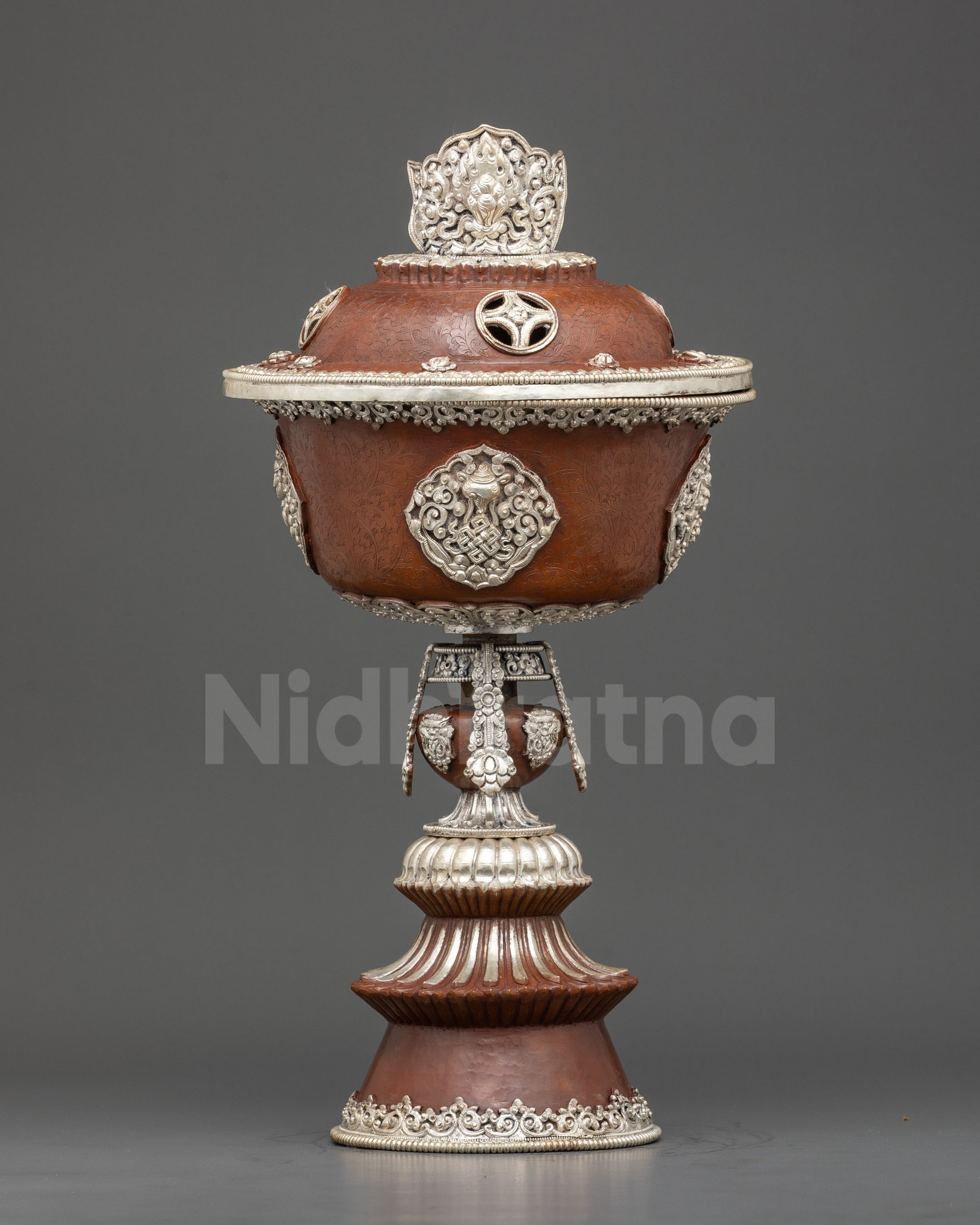 Front view Tibetan Butter Lamp copper with silver plating, intricate floral designs, Buddhist symbols