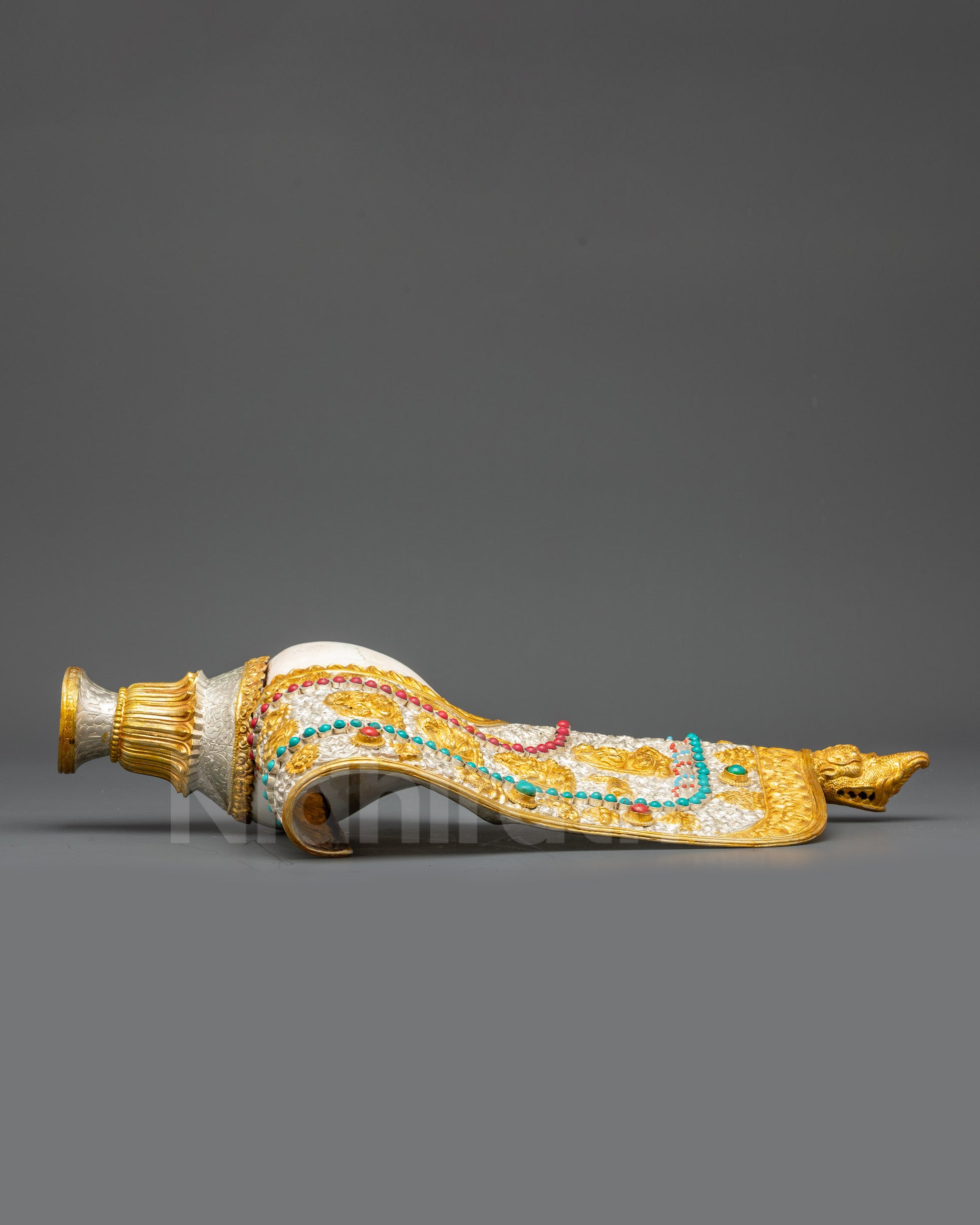 Front view Tibetan Conch Shell gold and silver-plated with semi-precious stones