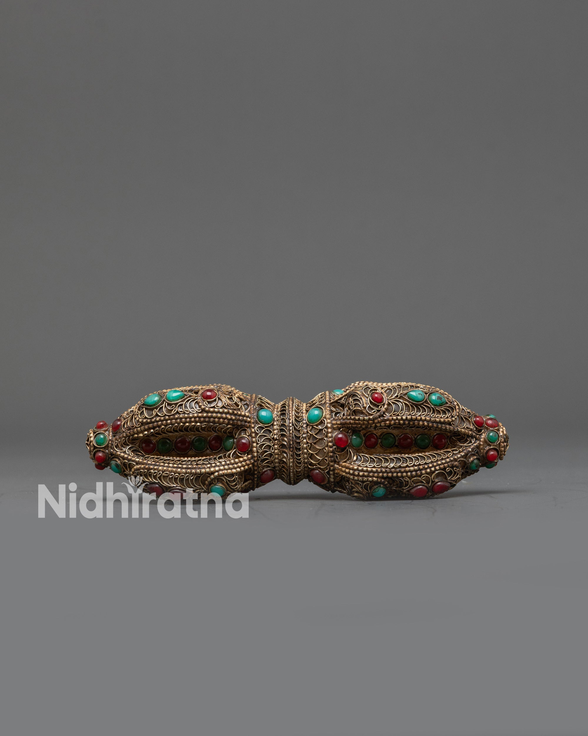 Front view Tibetan Vajra Dorje with crystal core and semi-precious stones