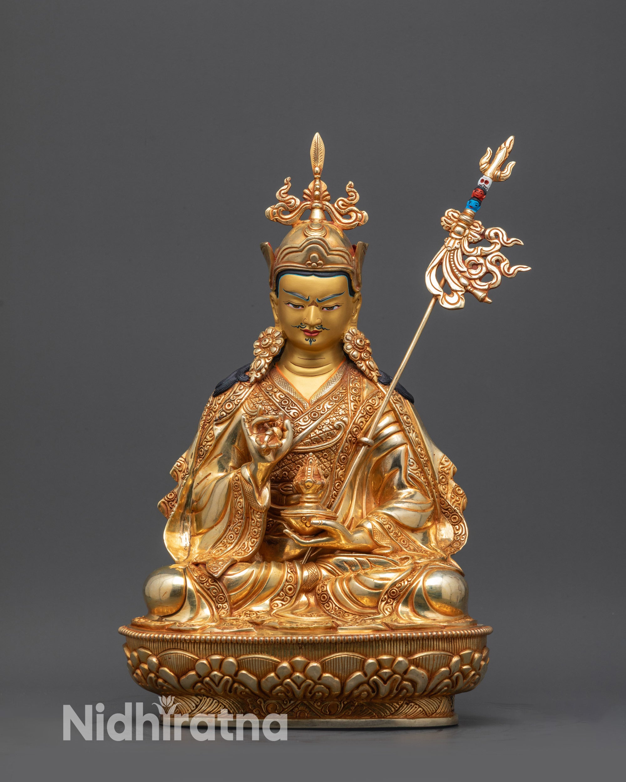 Front view Tsokye Dorje Statue on lotus pedestal with gold-gilded face and intricate robes