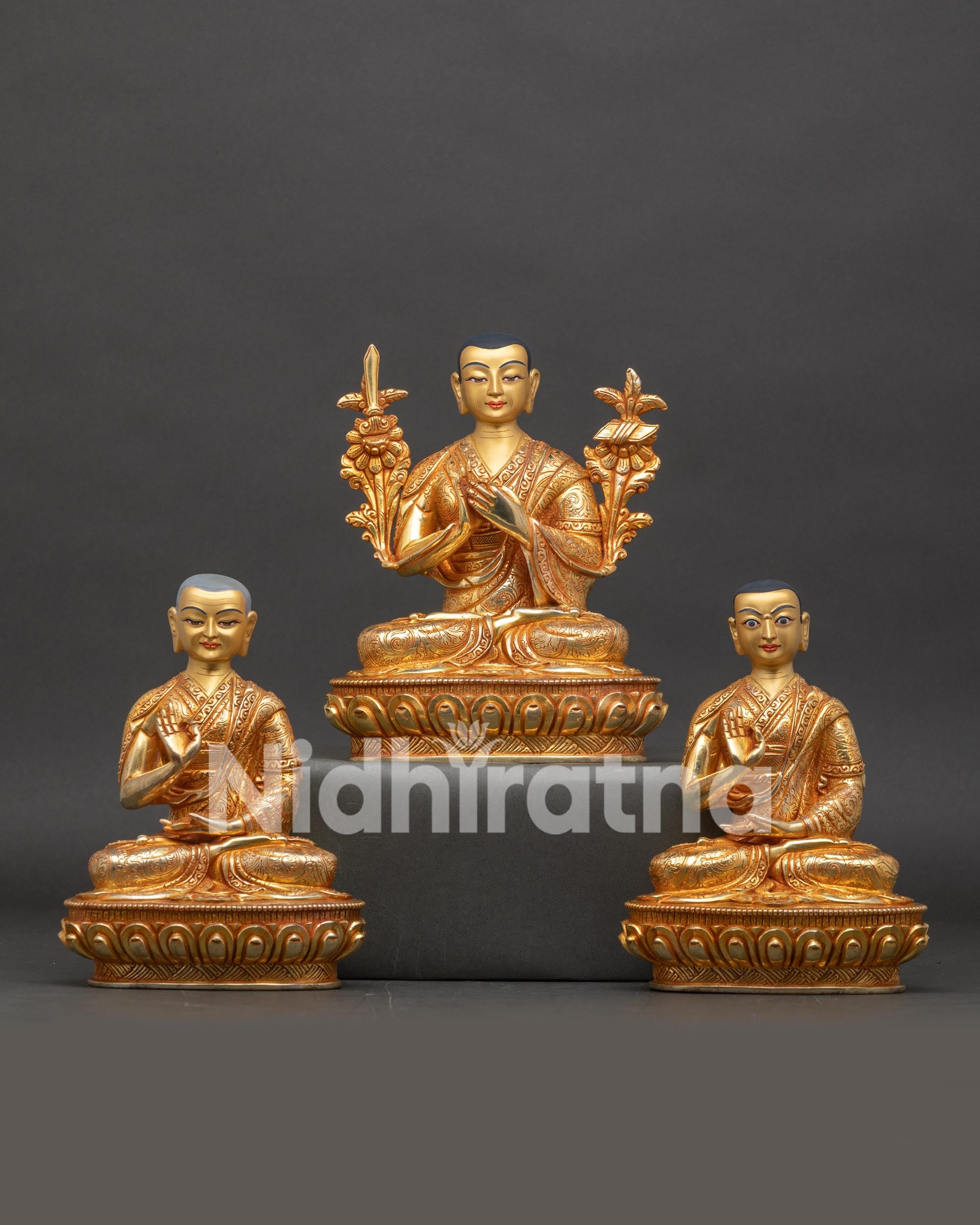 Front view of Tsongkhapa altar set sacred trio handcrafted Newari artisans Patan Nepal gold painted face meditation