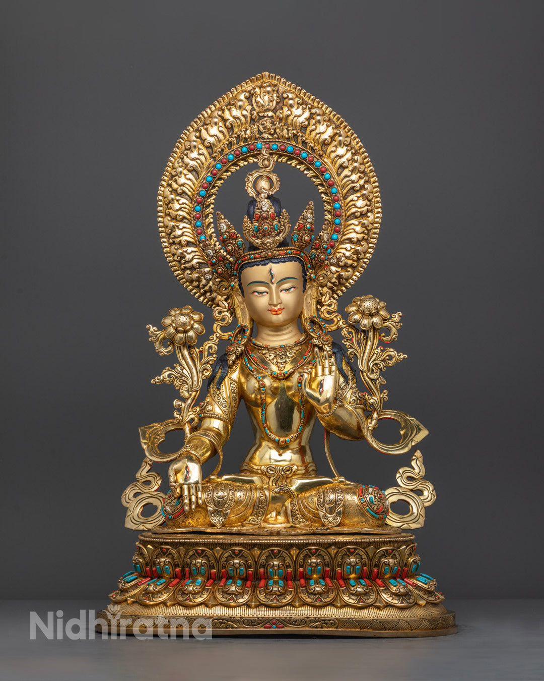 Front view White Tara sculpture with gold body gemstones and Varada Mudra
