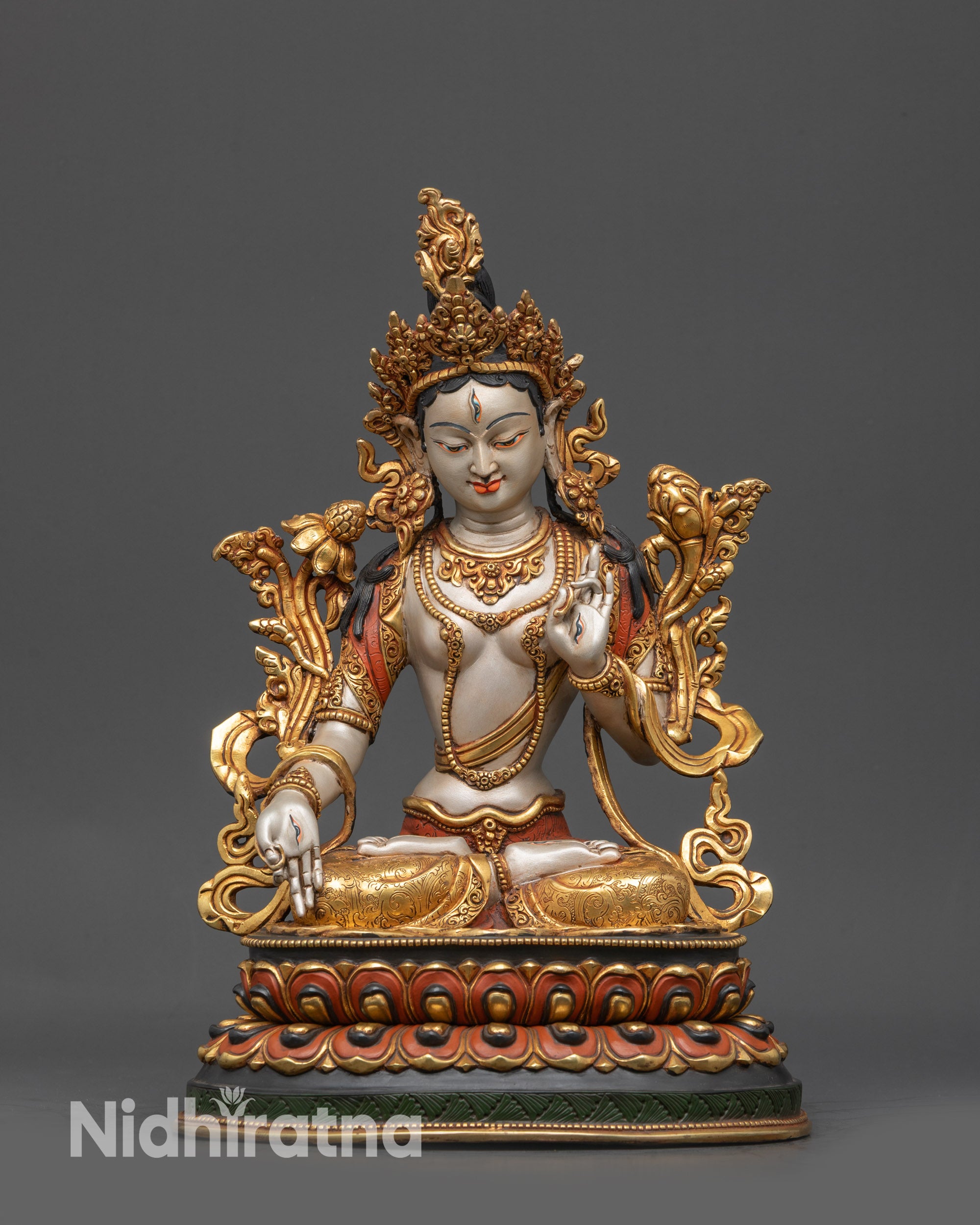 Front view White Tara statue with lotus pedestal and Varada Vitarka mudras