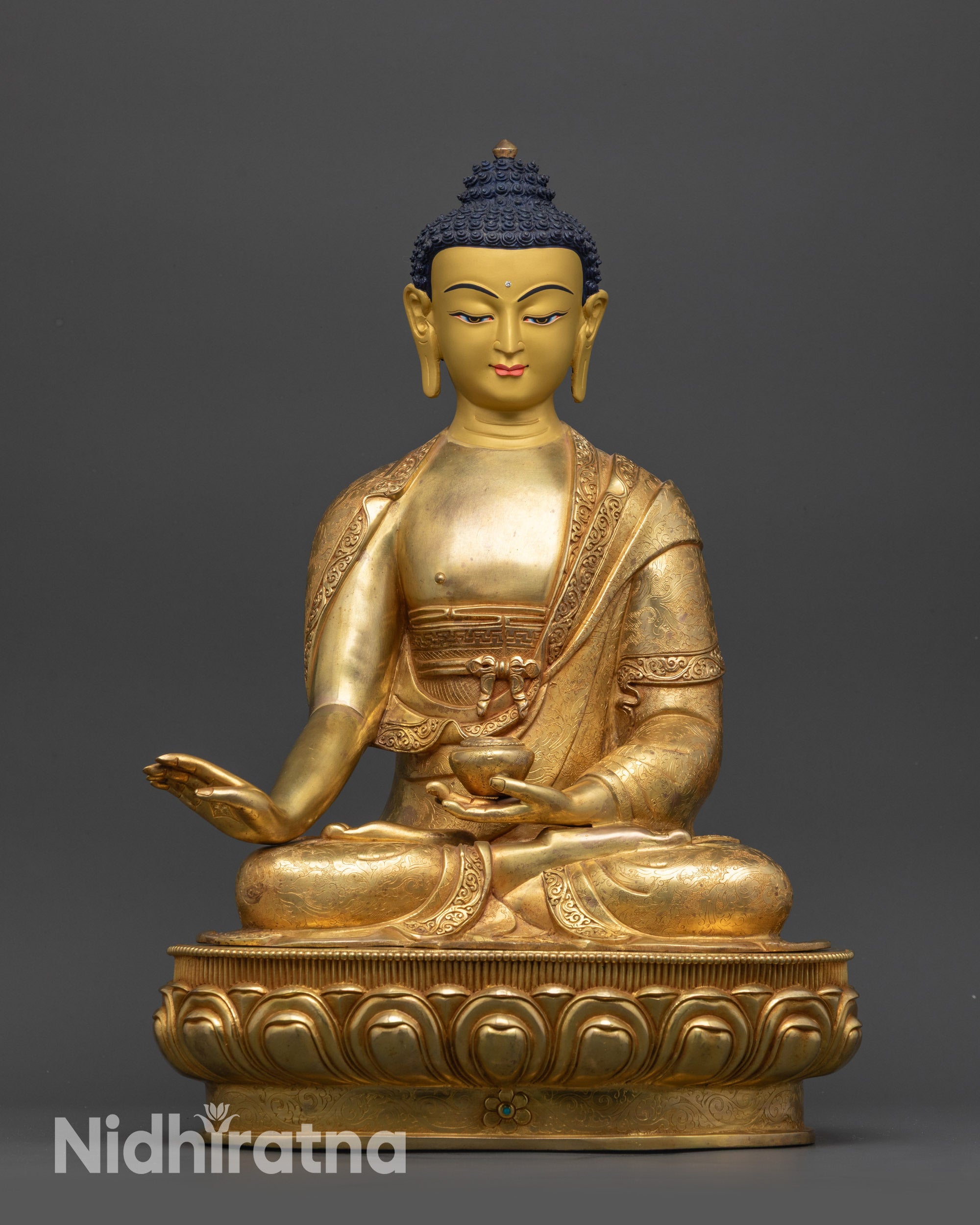 Front view of 17-inch Suparakirtita Namasri Buddha statue on gold-gilded base