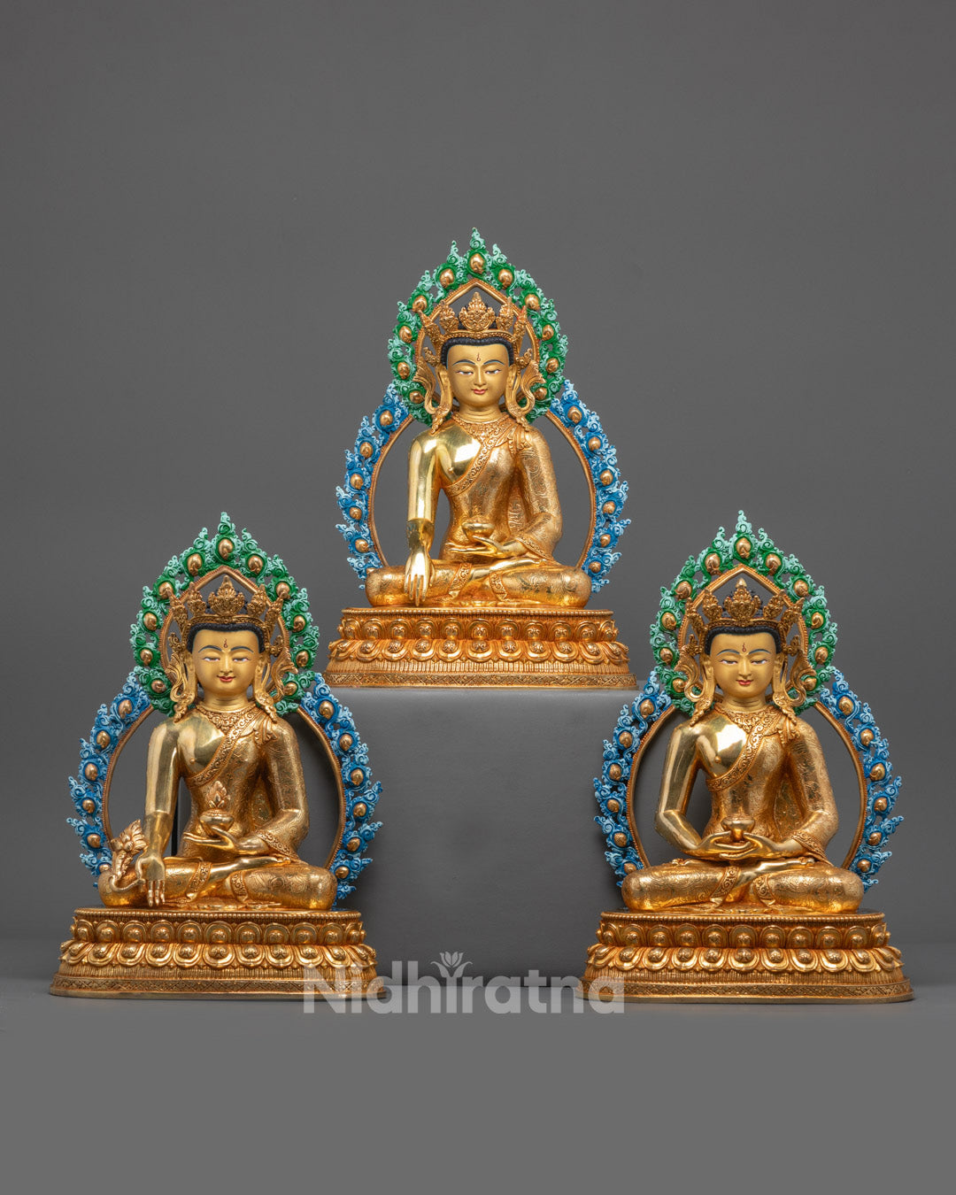 Front view of Amitabha Buddha statue with gold fire-gilding and lotus throne details