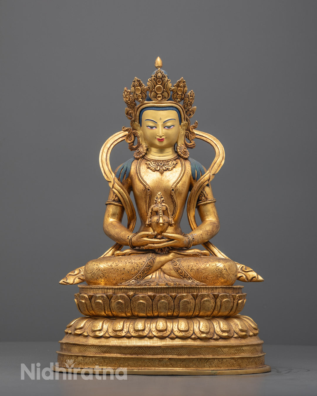Front view of Amitayus Buddha statue with gold gilding and nectar vase