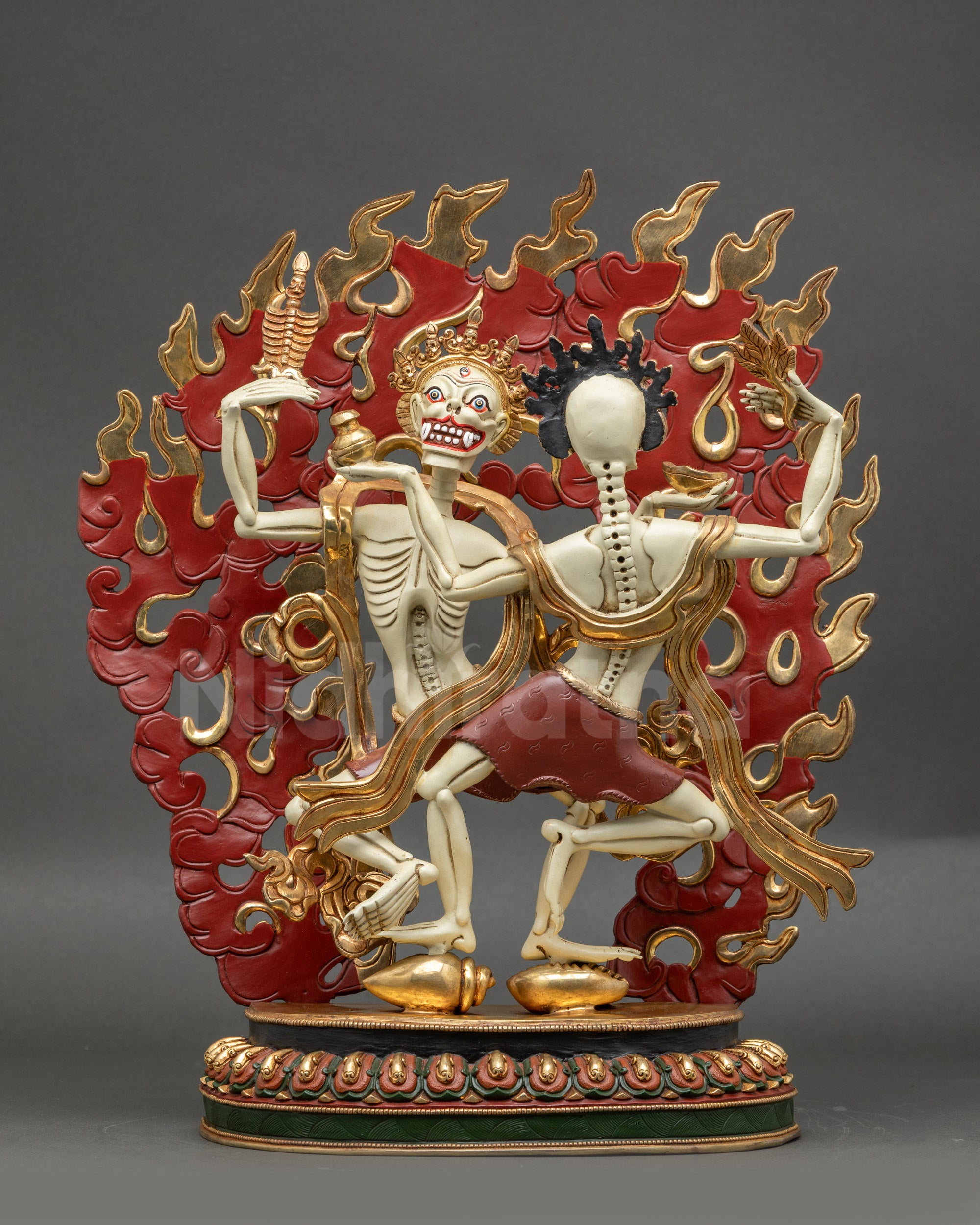 Front view of Dancing Citipati Sculpture showing male and female skeleton deities