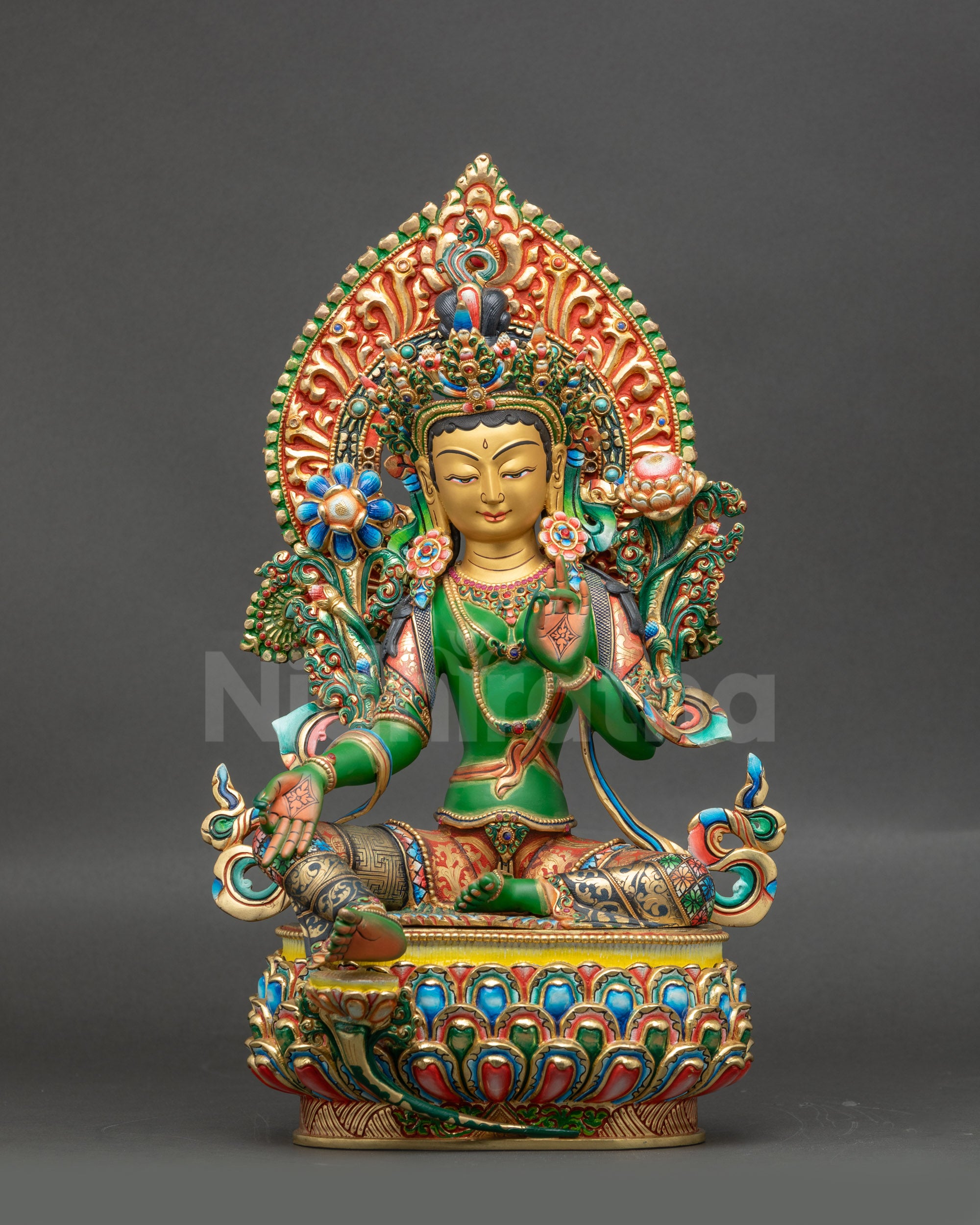Front view of Divine Green Tara Statue gold-gilded copper lotus seat holding utpala flower