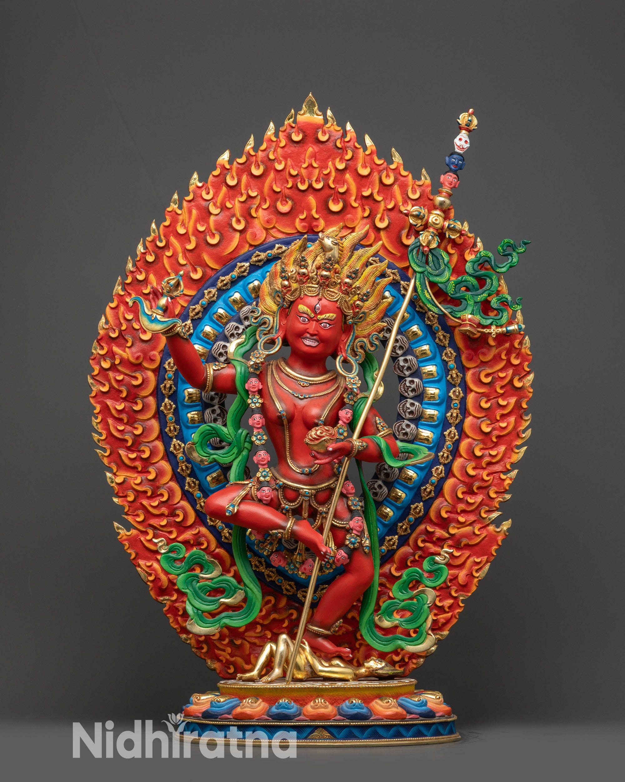 Front view of Dorje Phagmo statue with lotus base and vibrant red form