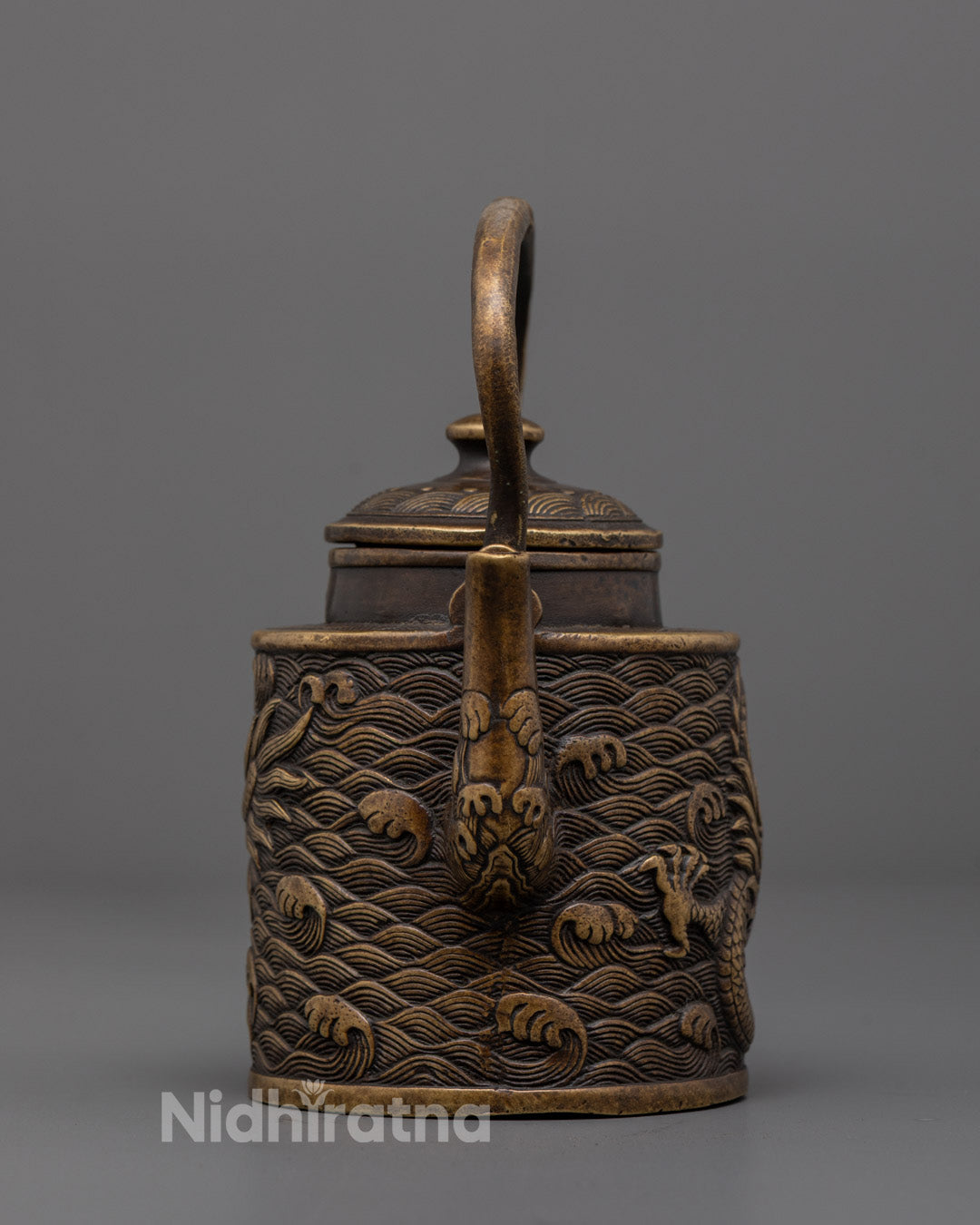 Front view of Dragon Carved Premium Tibetan Tea Pot for Buddhist rituals