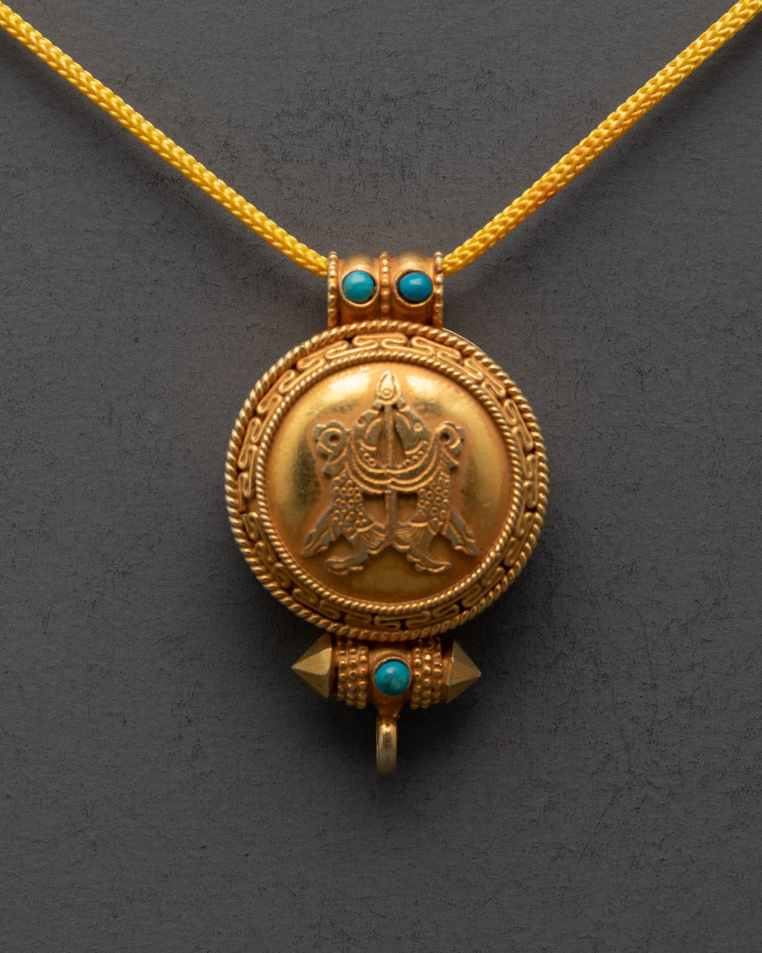 Front view of Fish Design Tibetan Ghau Pendant with gold gilded body and floral patterns
