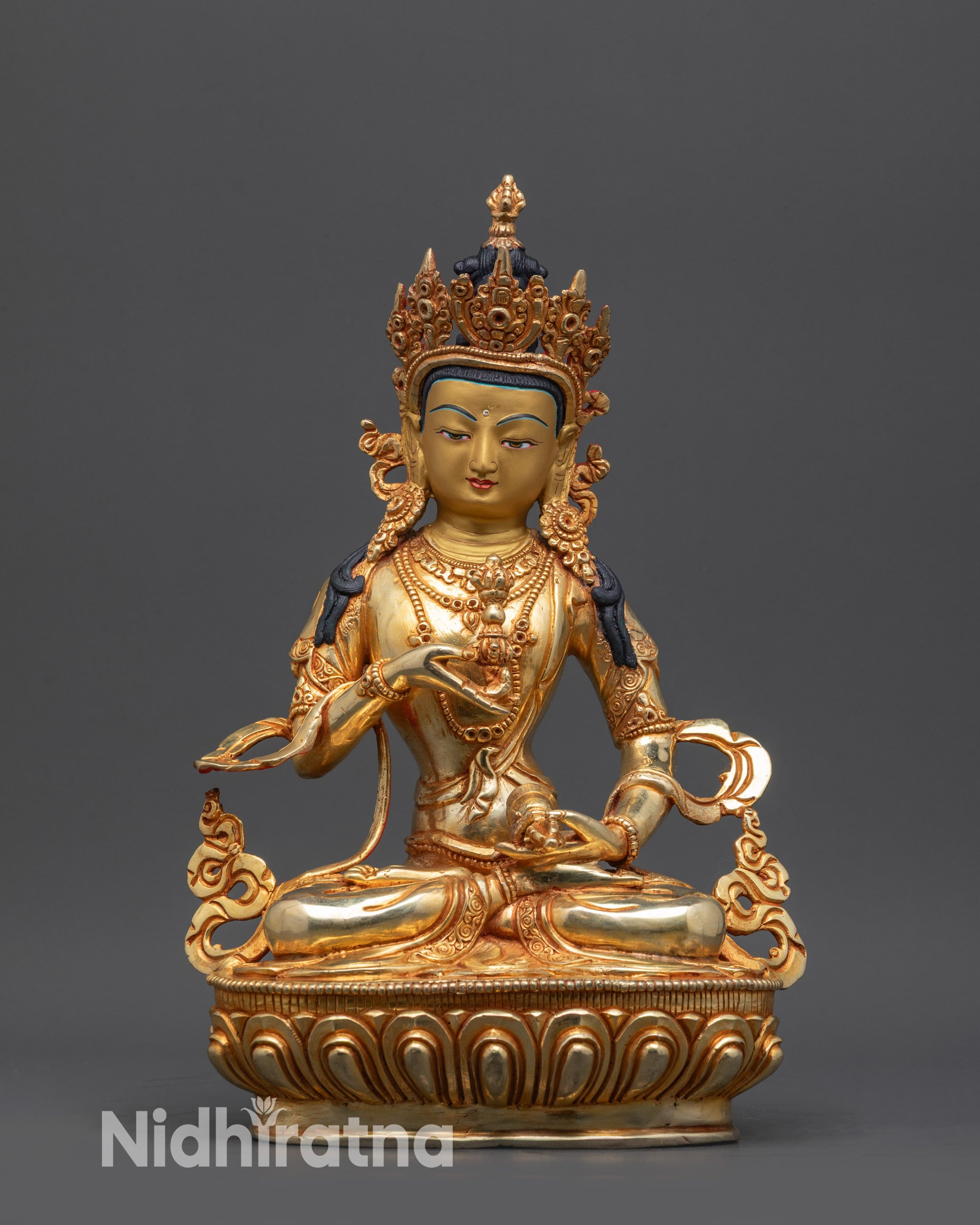 Front view of Golden Vajrasattva statue with gold-gilded face, five-jeweled crown, lotus seat