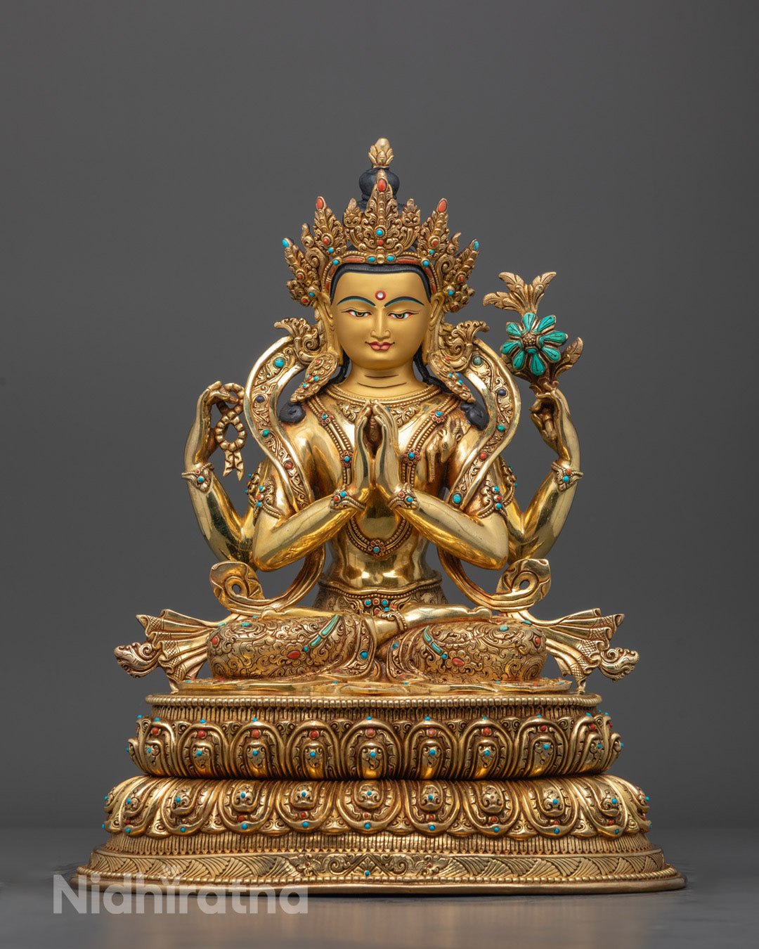 Front view of Hand-Carved Chenrezig Statue with gold gilding and semi-precious stones
