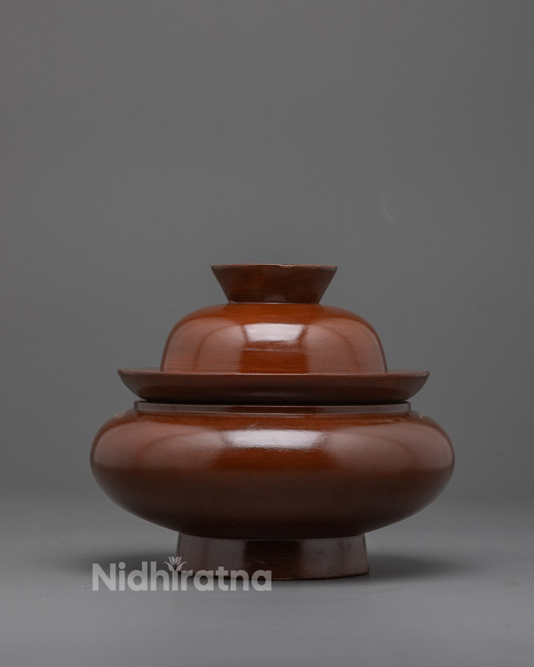 Front view of Handmade Wooden Paru Bowl with dark brown polished finish