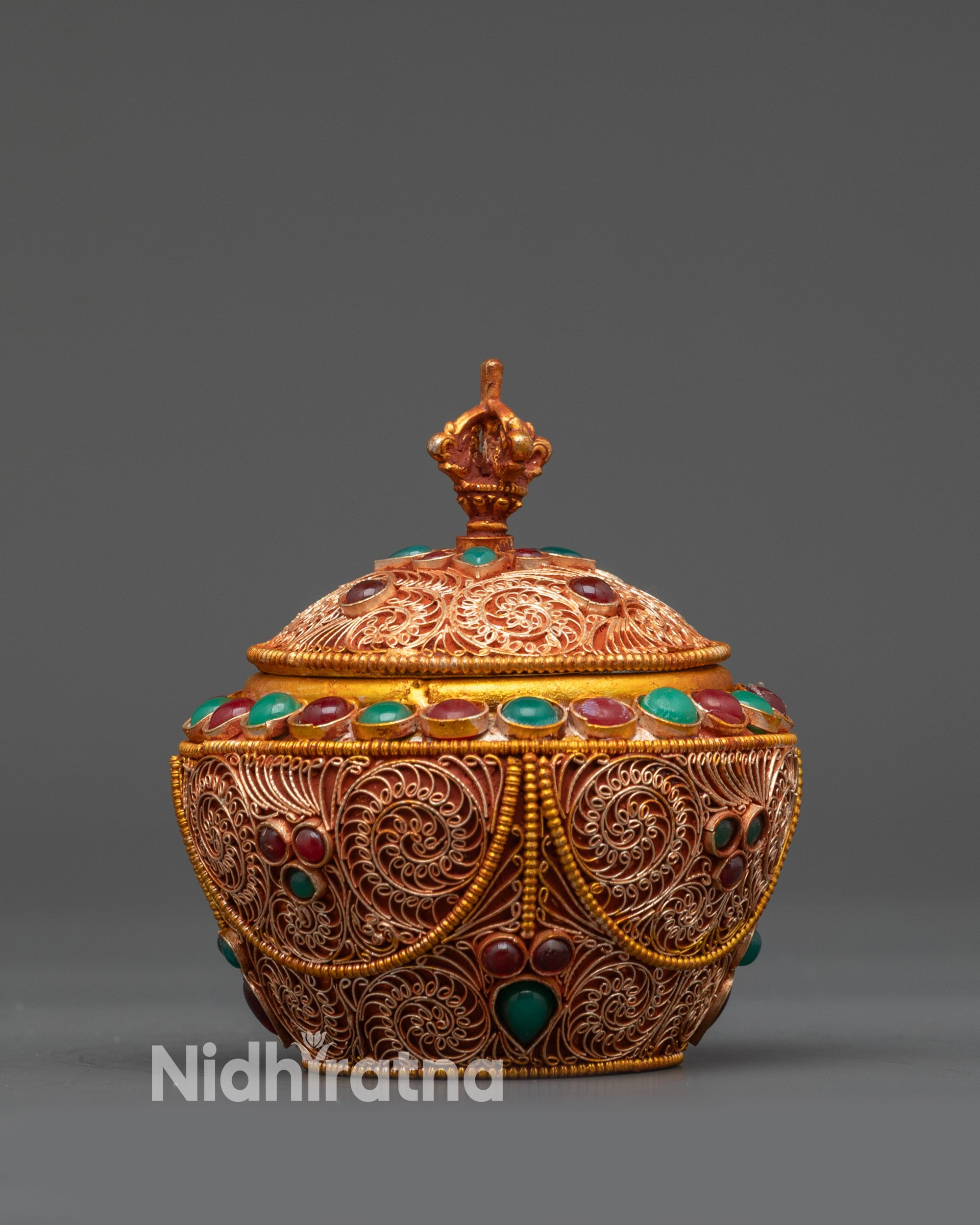 Front view of Himalayan Copper Gulpa Rice Pot with gold filigree and deity carvings