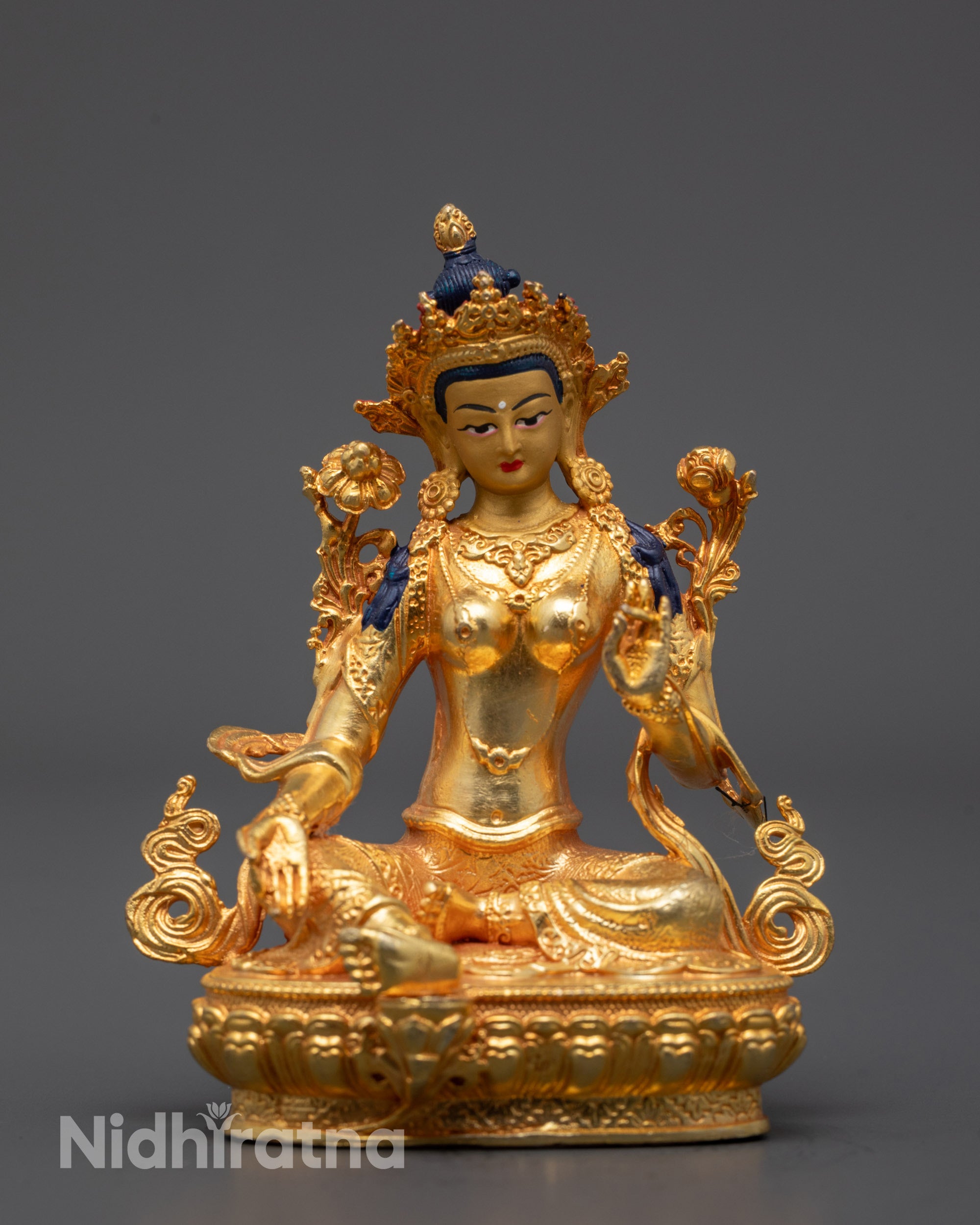 Front view of MachineMade Green Tara statue with gold-plated body and lotus throne