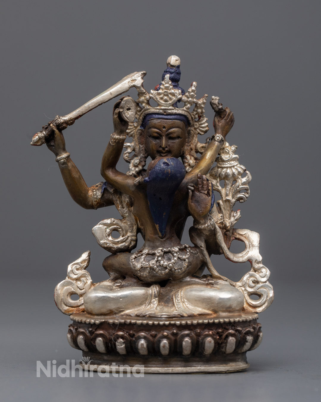 Manjushri with Consort Statue made from oxidized copper with silver plating and vibrant acrylic colors, handcrafted in Nepal