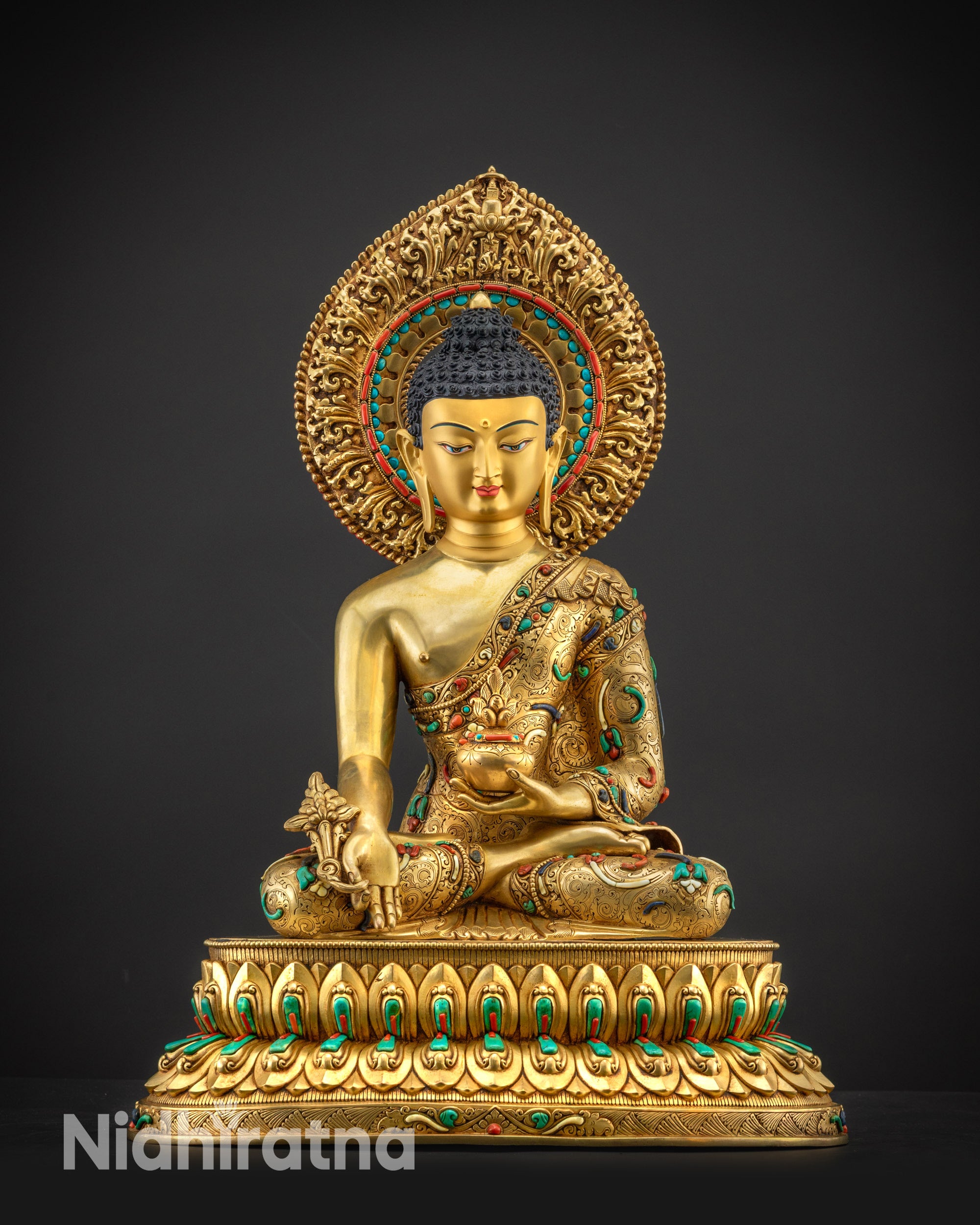 Front view of Masterpiece Medicine Buddha Statue with serene gold-gilded calm facial expression
