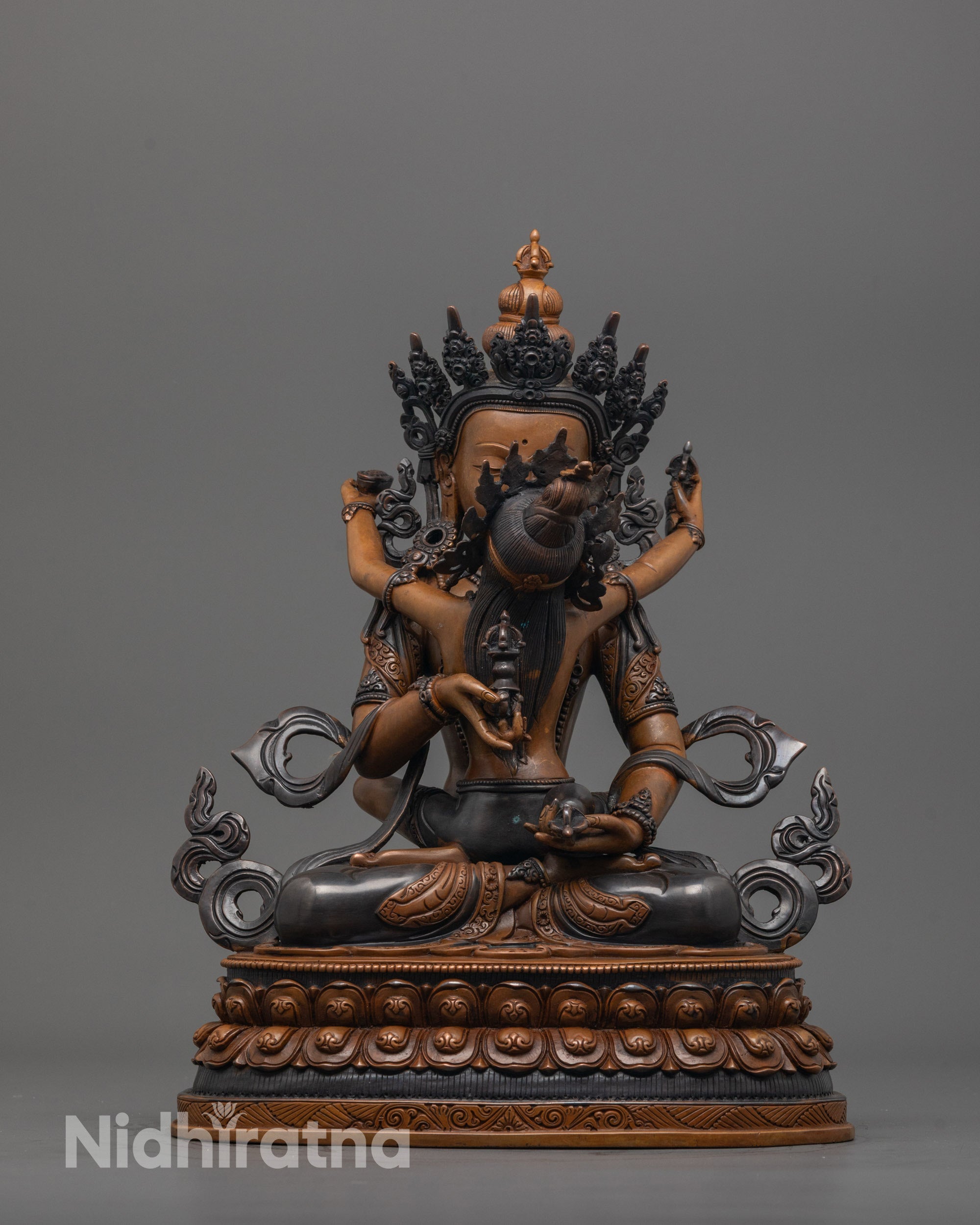 Front view of Oxidized Vajrasattva Union Statue with intricate carvings and two copper shades