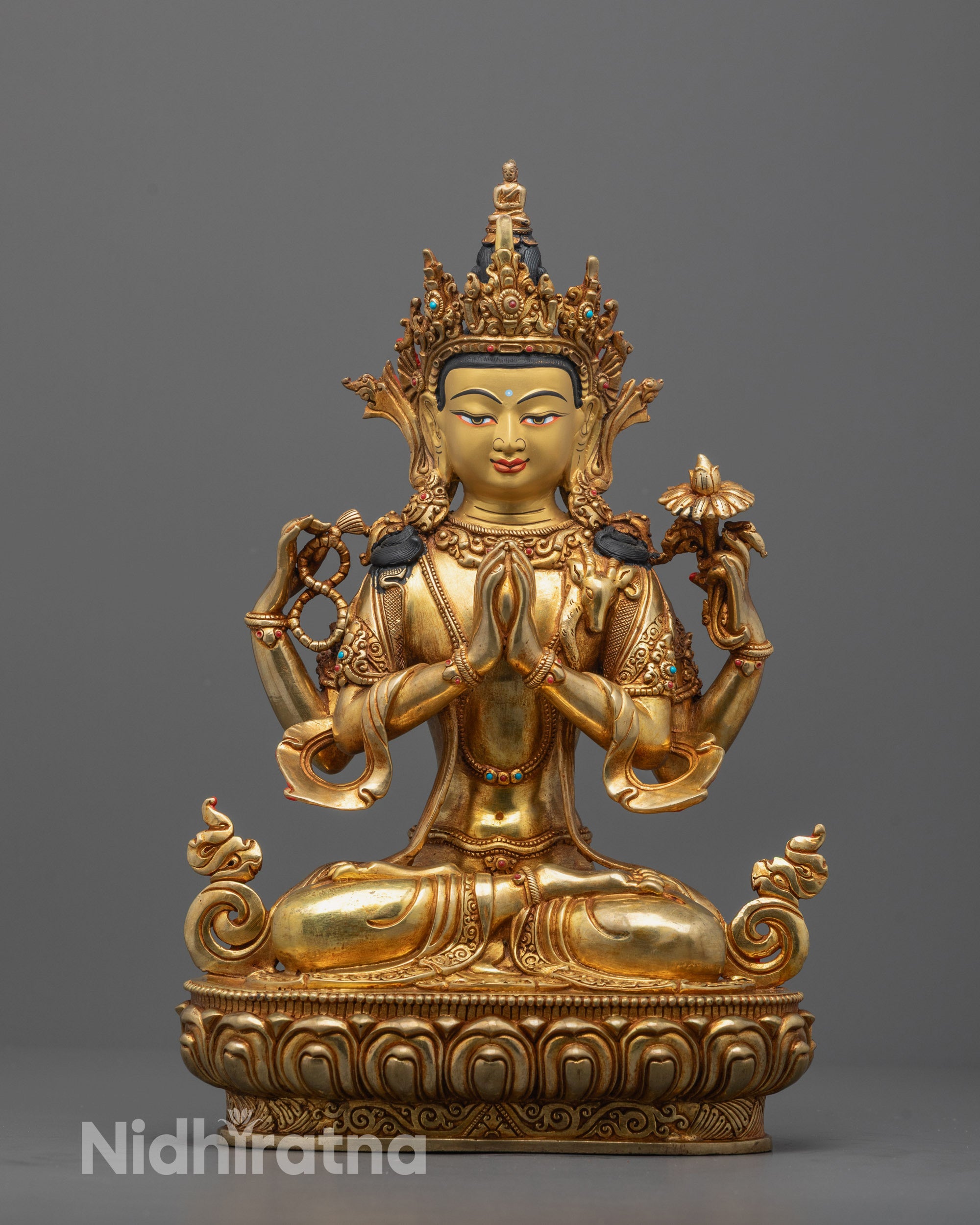 Front view of Sacred Four-Armed Chenrezig statue with gold gilding and semi-precious stones
