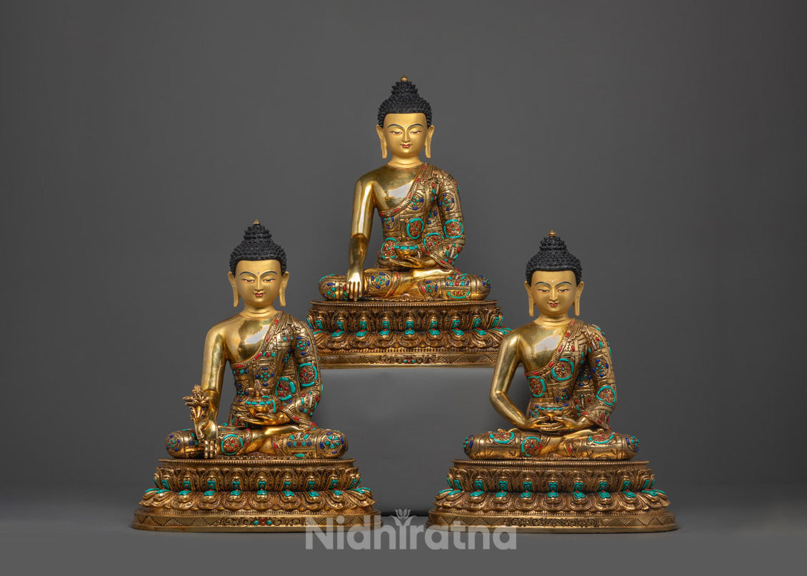 Front view of Sacred Three Buddha Set with gold-gilded faces and semi-precious stones