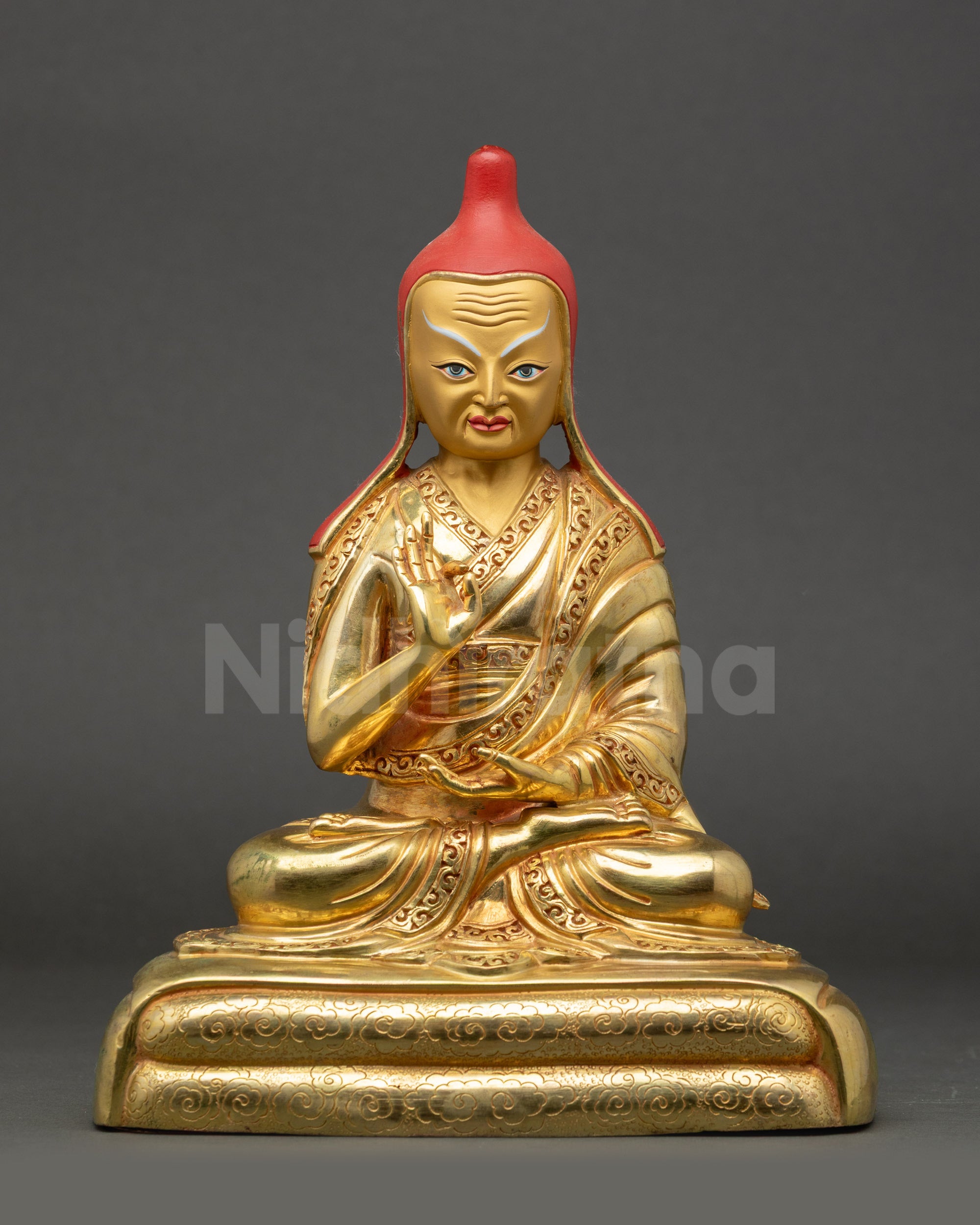 Front view of Santarakshita Statue holding Vajrayana texts and Abhaya Mudra