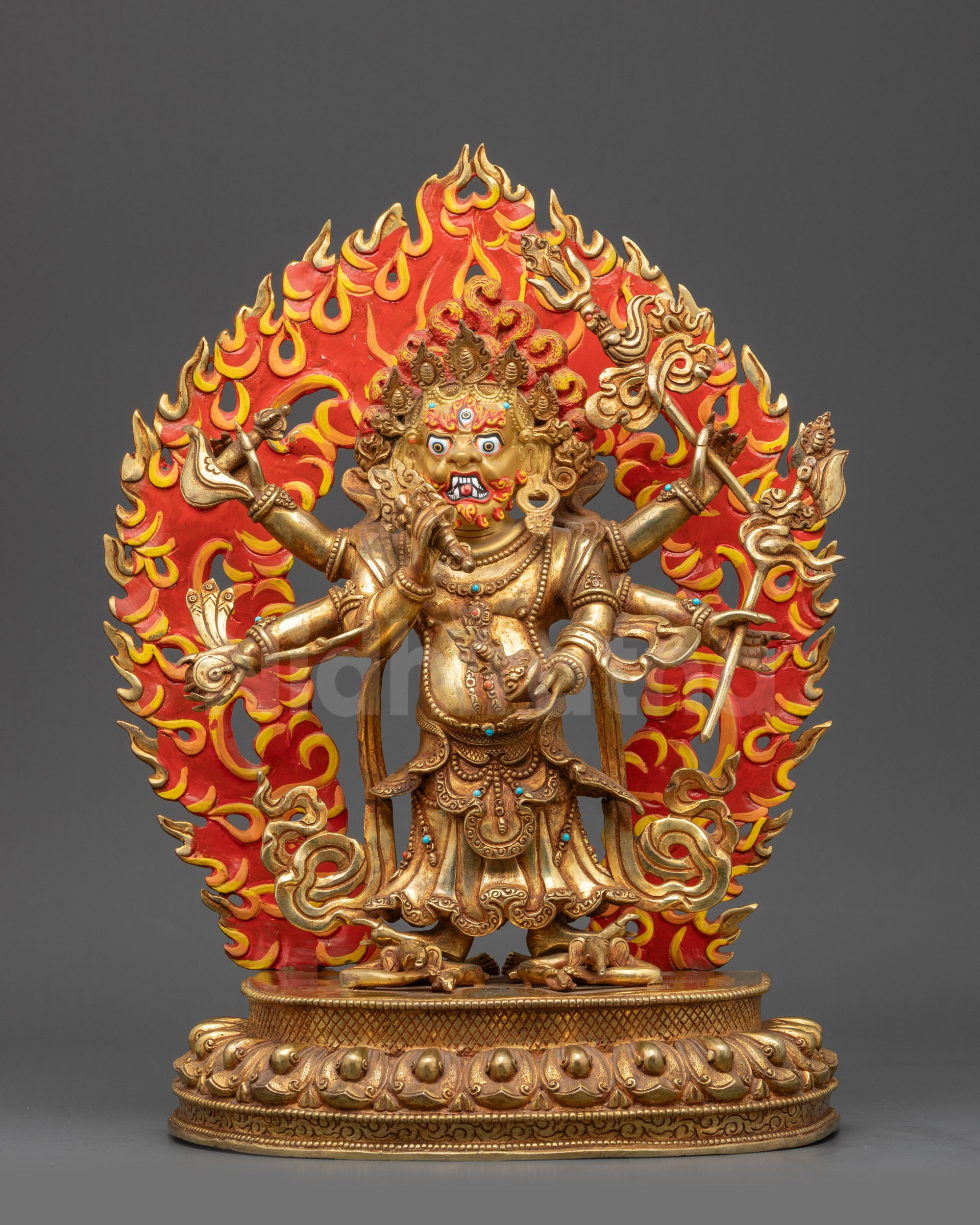 Front view of Six-armed White Mahakala statue on lotus seat with gold fire-gilded body