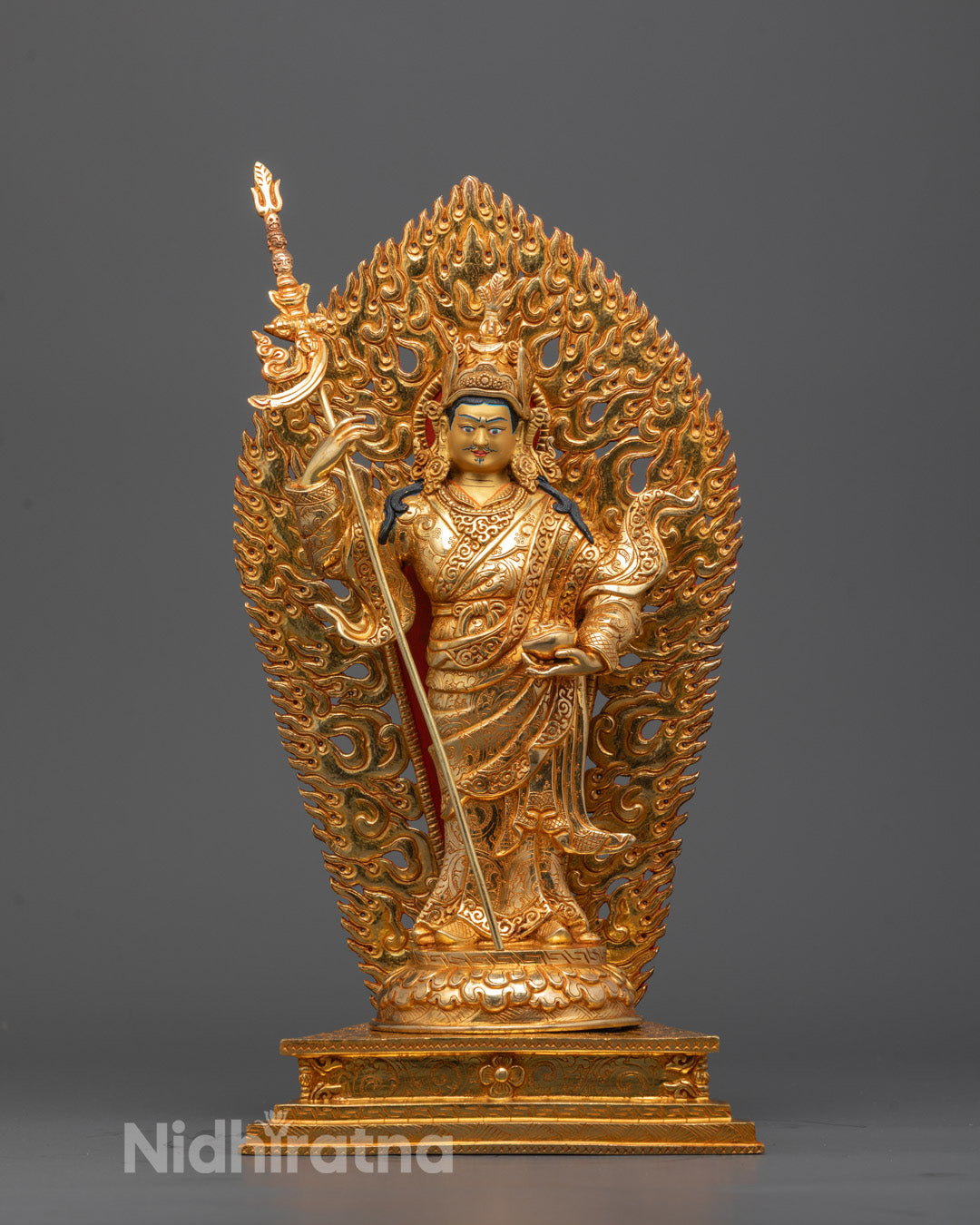 Front view of Standing Guru Rinpoche statue with 24K gold gilding and lotus throne