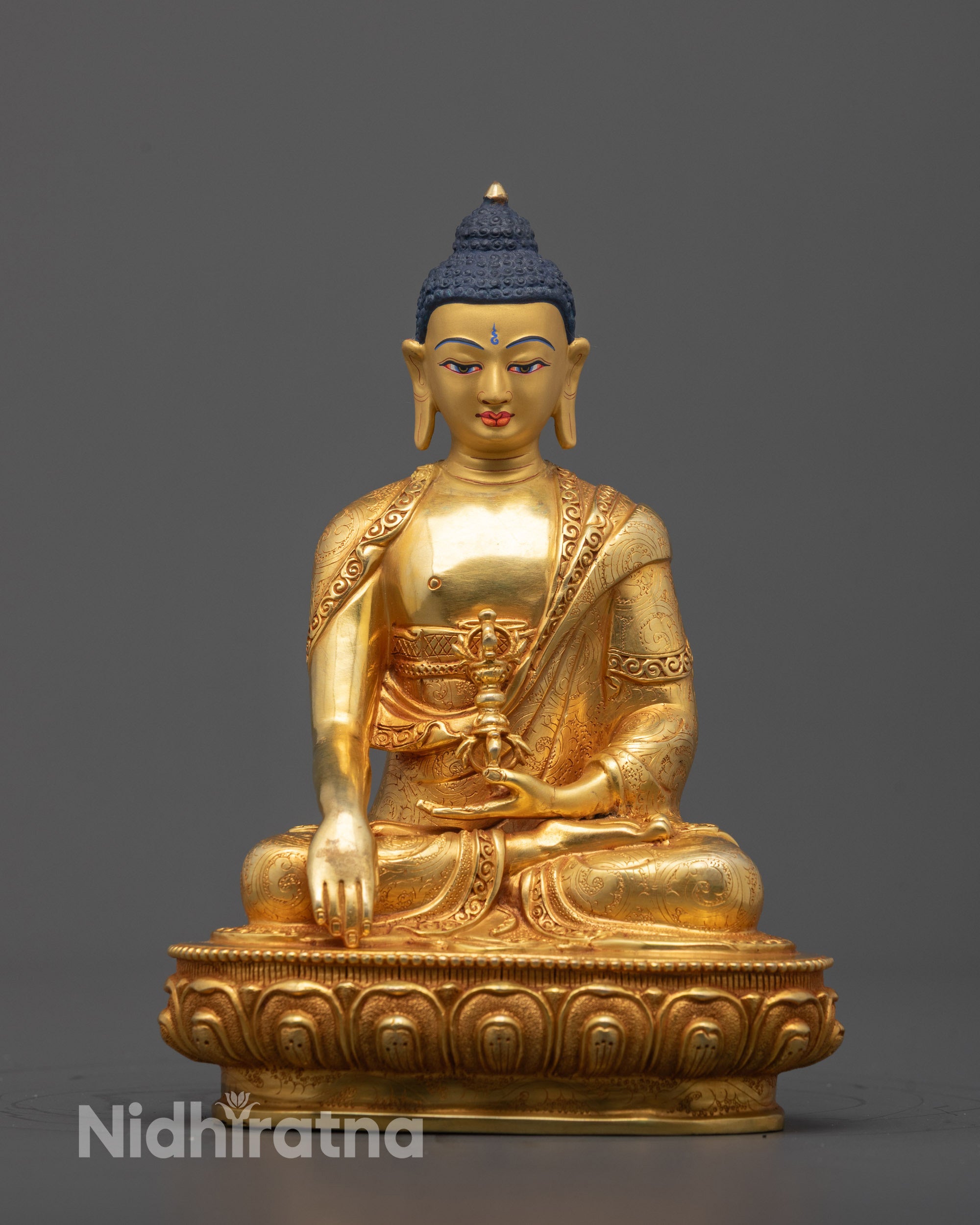 Front view of Vajra Mitrugpa Statue with gold-gilded face and fire-gilded body