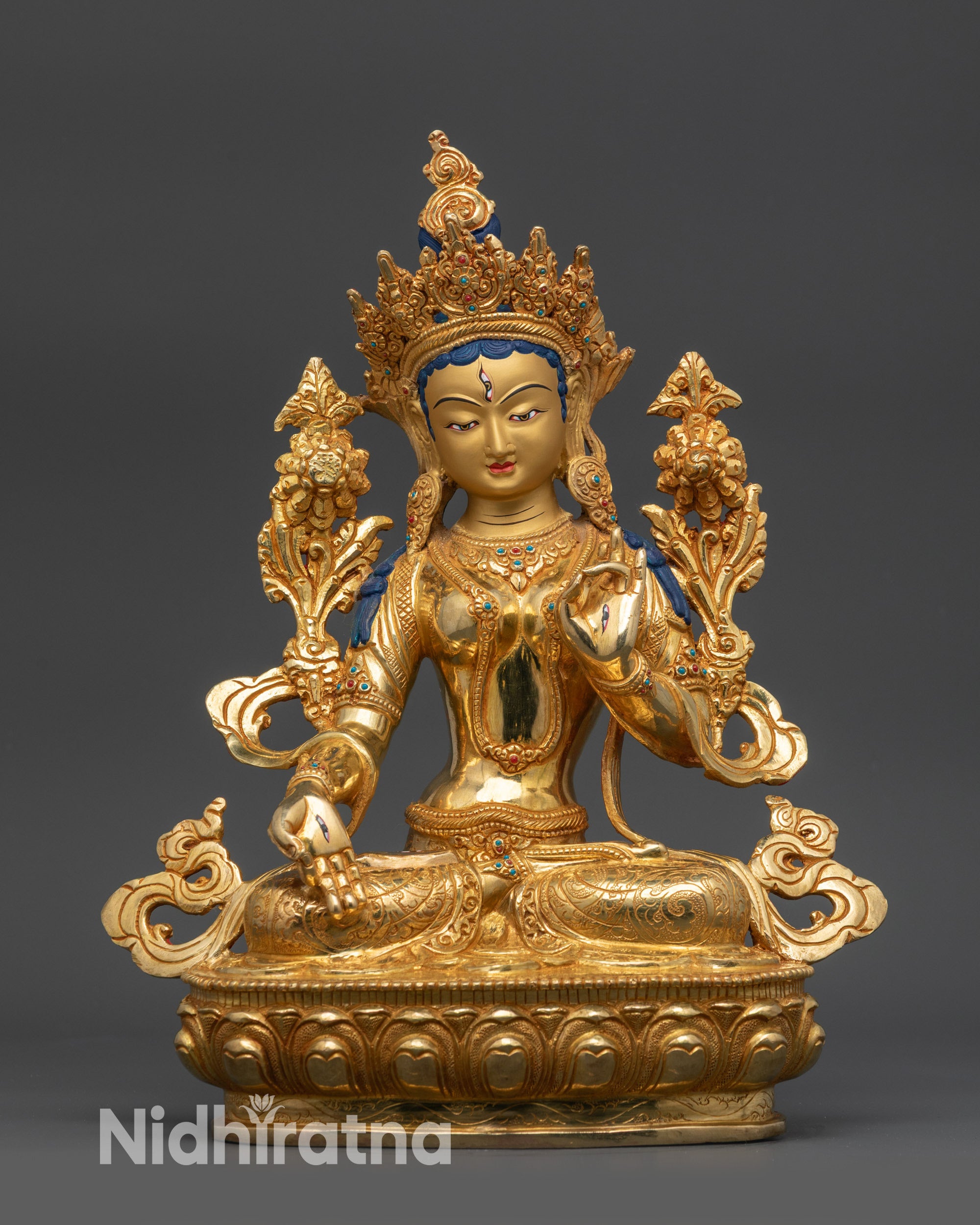 Front view of White Tara statue, gold-gilded copper, lotus seat, meditation décor