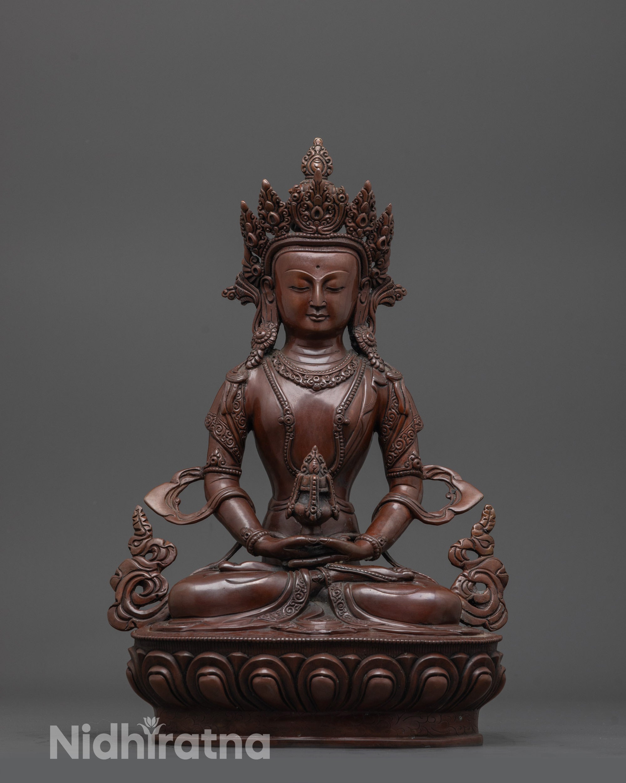 Front view of hand-carved Amitayus Statue seated on a lotus seat holding a nectar-filled kalash