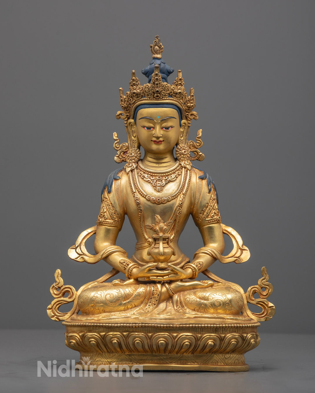 Front view of hand-carved Amitayus statue with 24k gold gilding and lotus throne