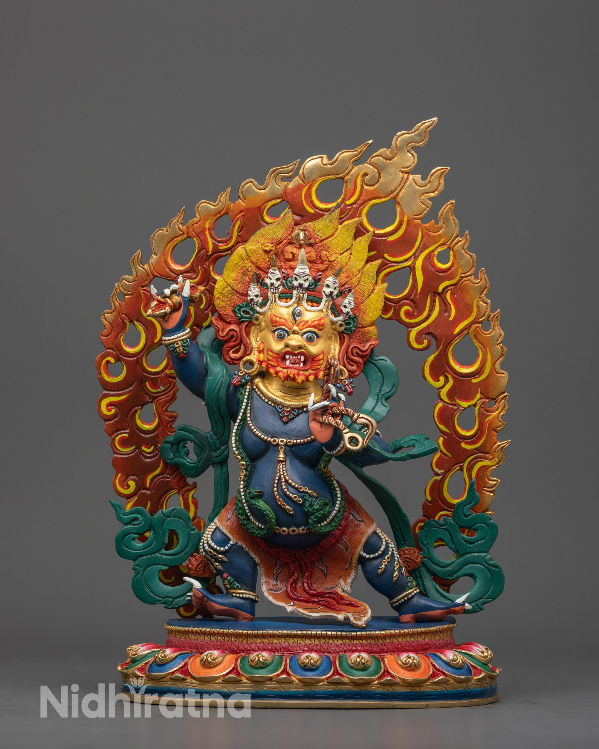 Front view of hand-carved Blue Vajrapani Statue standing on a lotus base