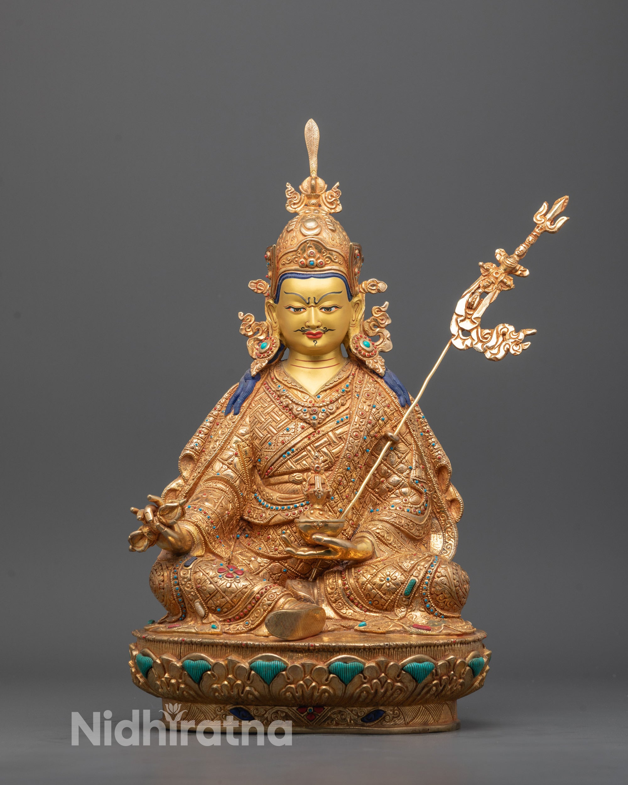 Front view of hand-carved Guru Rinpoche Statue seated on lotus throne with semi-wrathful