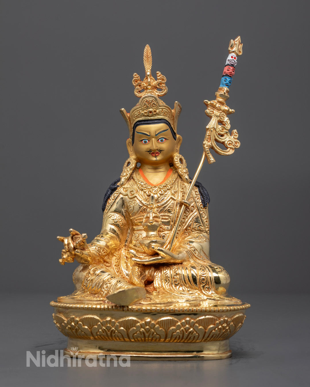 Front view of hand-carved Guru Rinpoche statue with 24k gold fire-gilding
