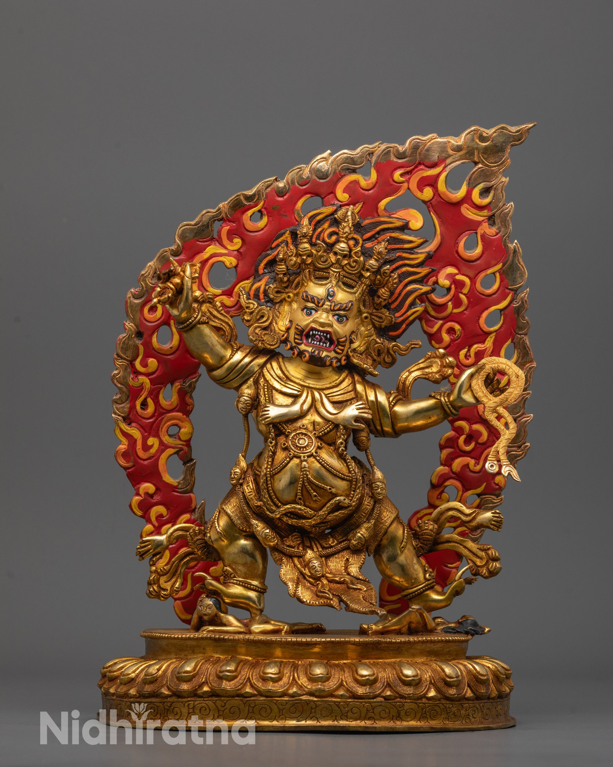 Front view of hand-carved Vajrapani Statue standing on a lotus base with a vajra