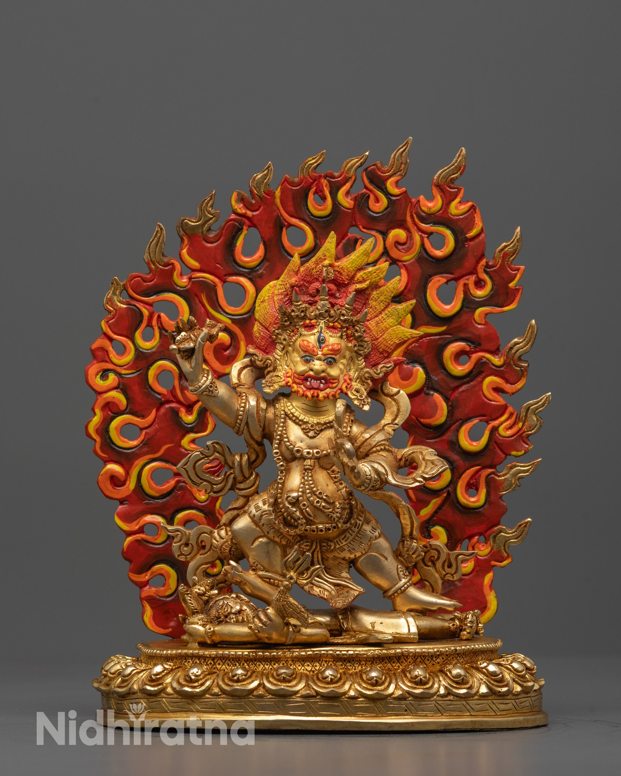 Front view of hand-carved Vajrapani statue standing on lotus base with 24k gold fire gilding