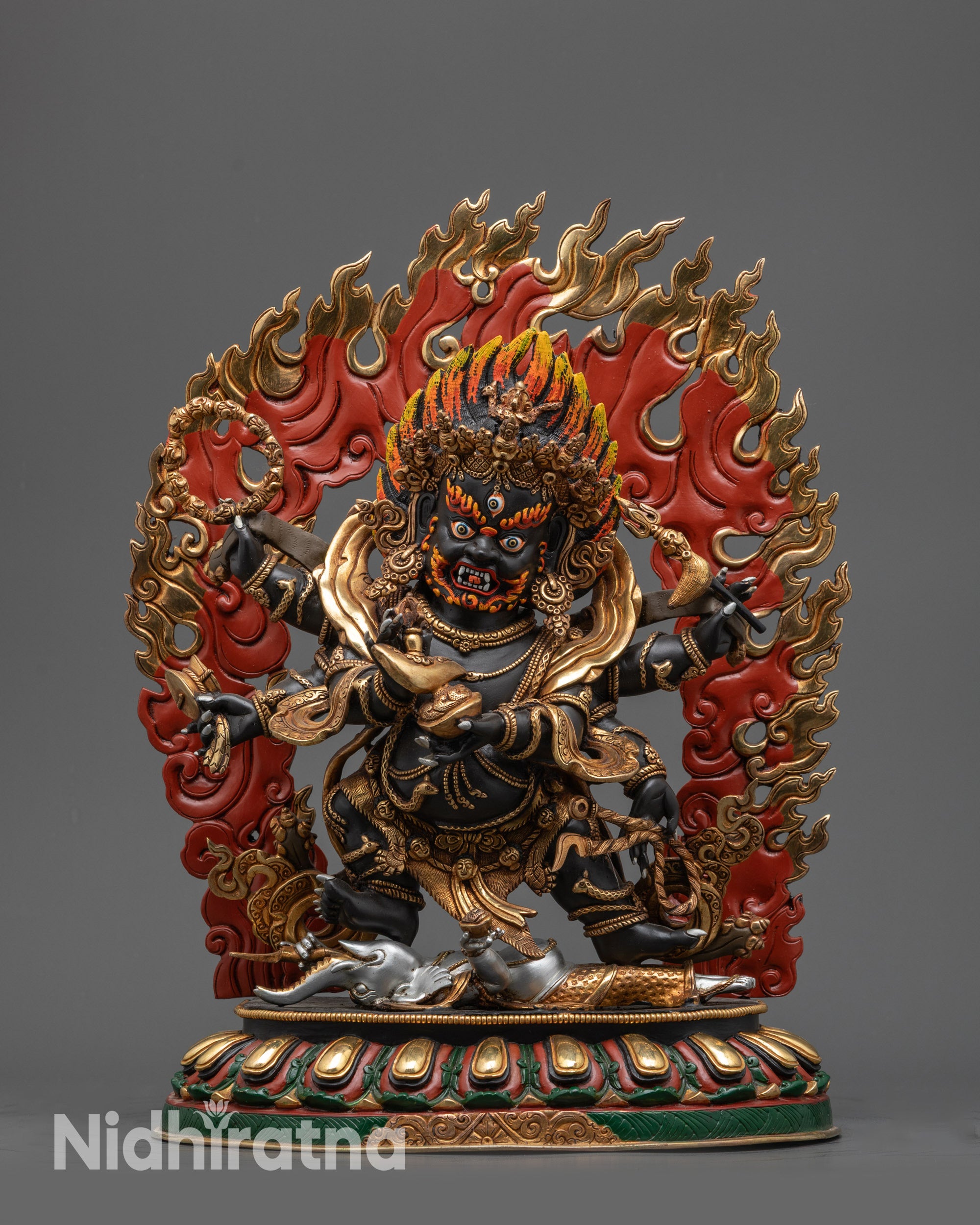 Front view of hand-painted Six-Armed Mahakala Statue on lotus seat with gold robe