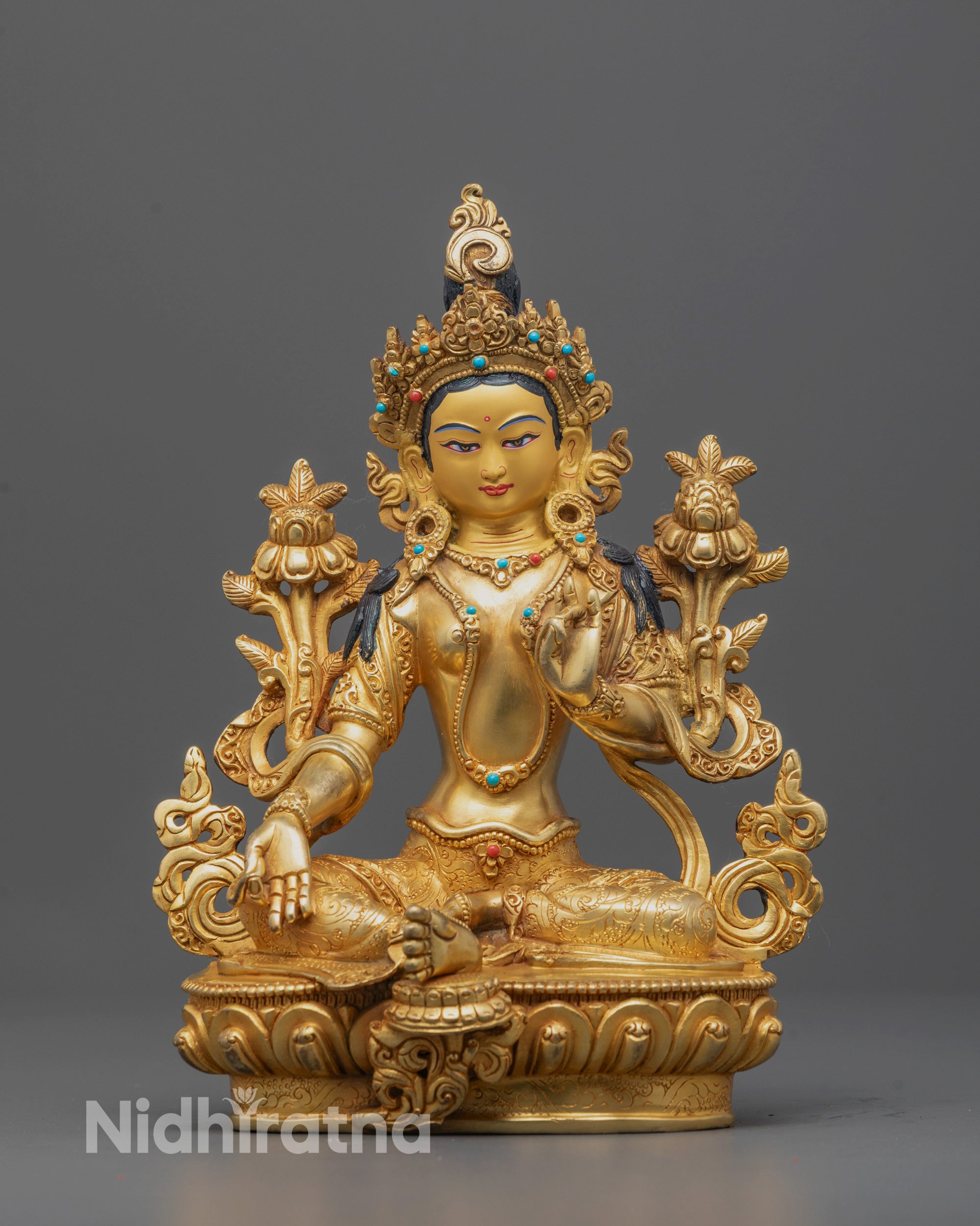Front view of the Green Tara Statue seated on a lotus base in a meditative posture
