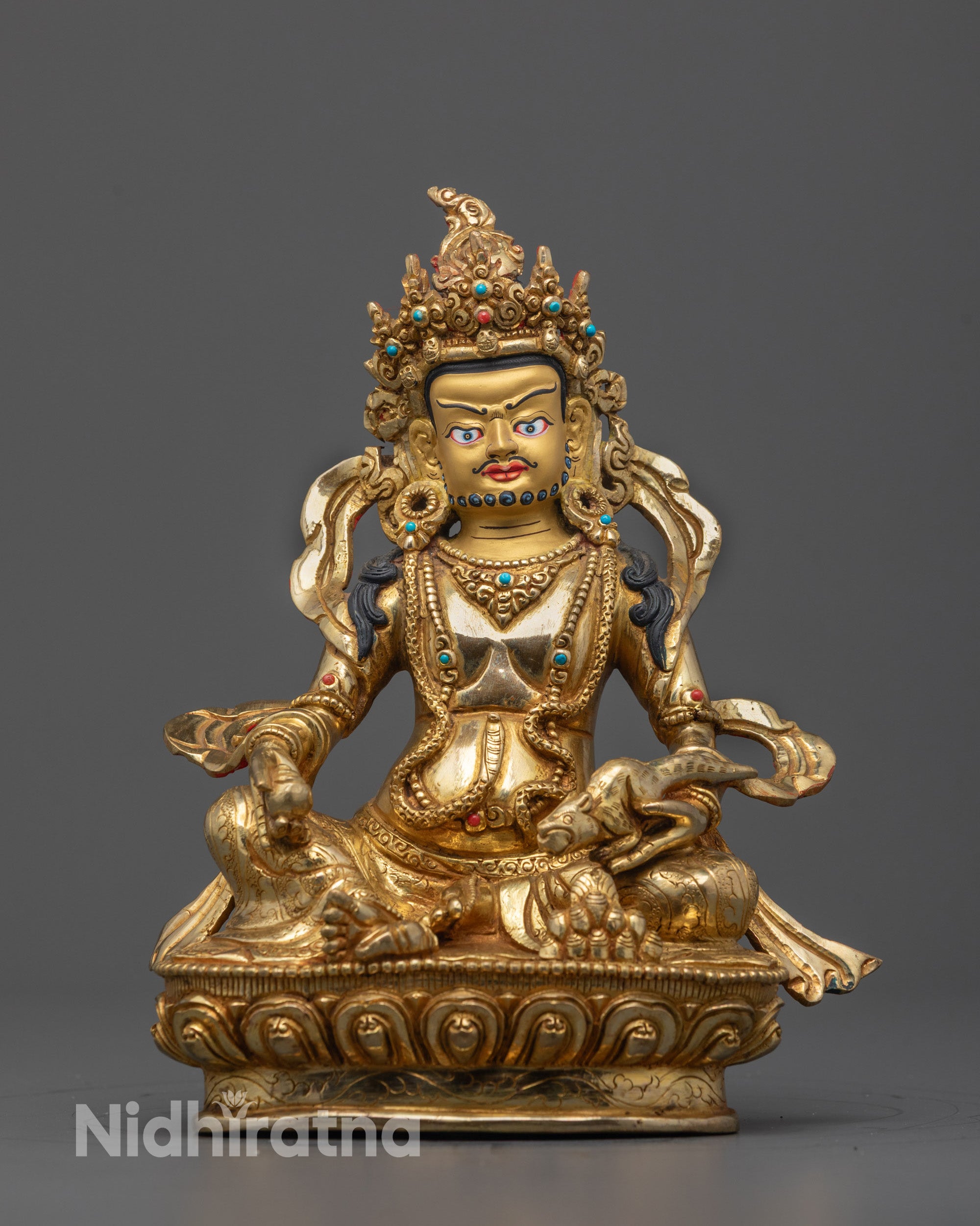 Front view of the hand-carved Dzambhala Statue with 24k fire gold gilding