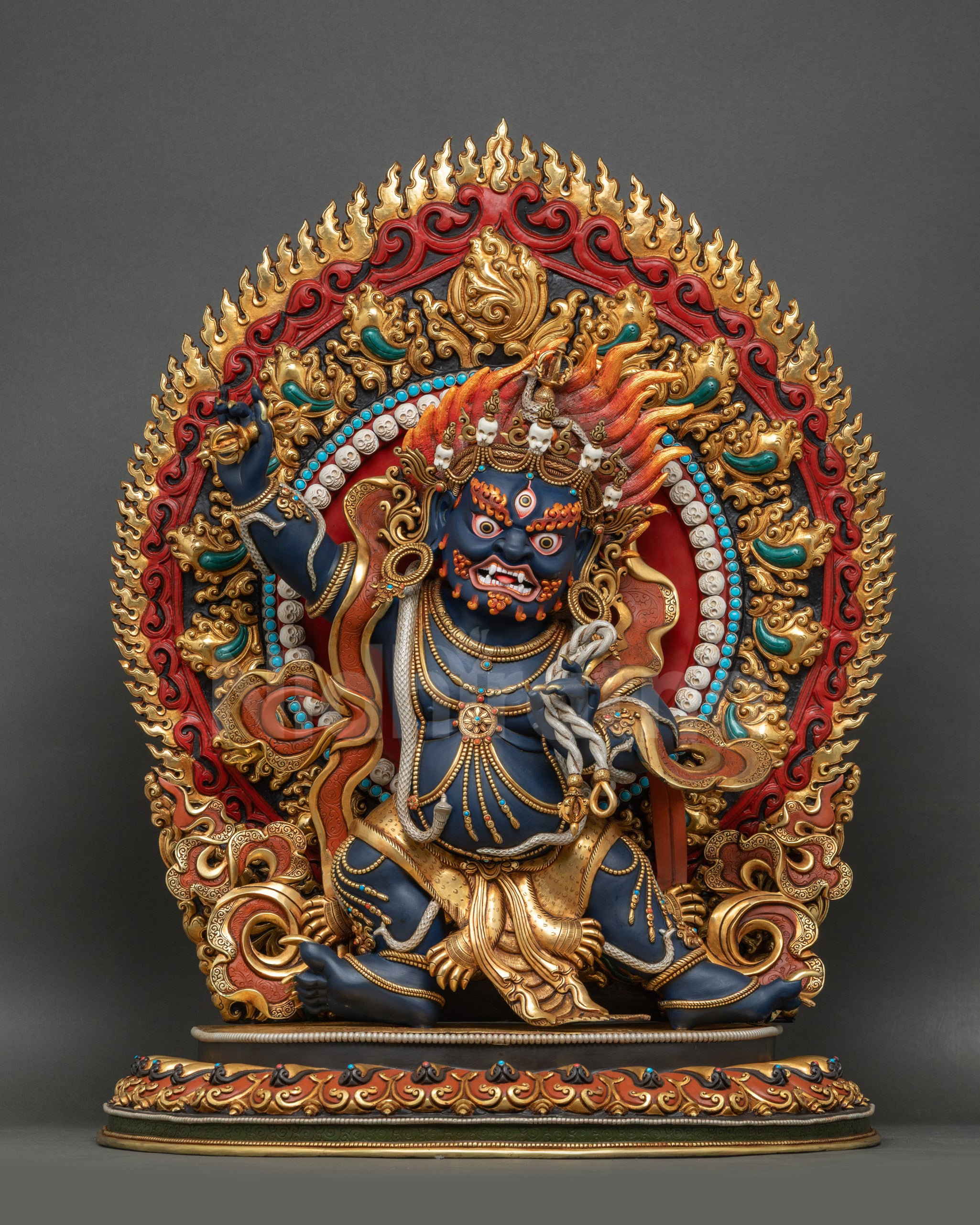 Front view of wrathful Vajrapani Statue, Nepalese protector deity on lotus seat